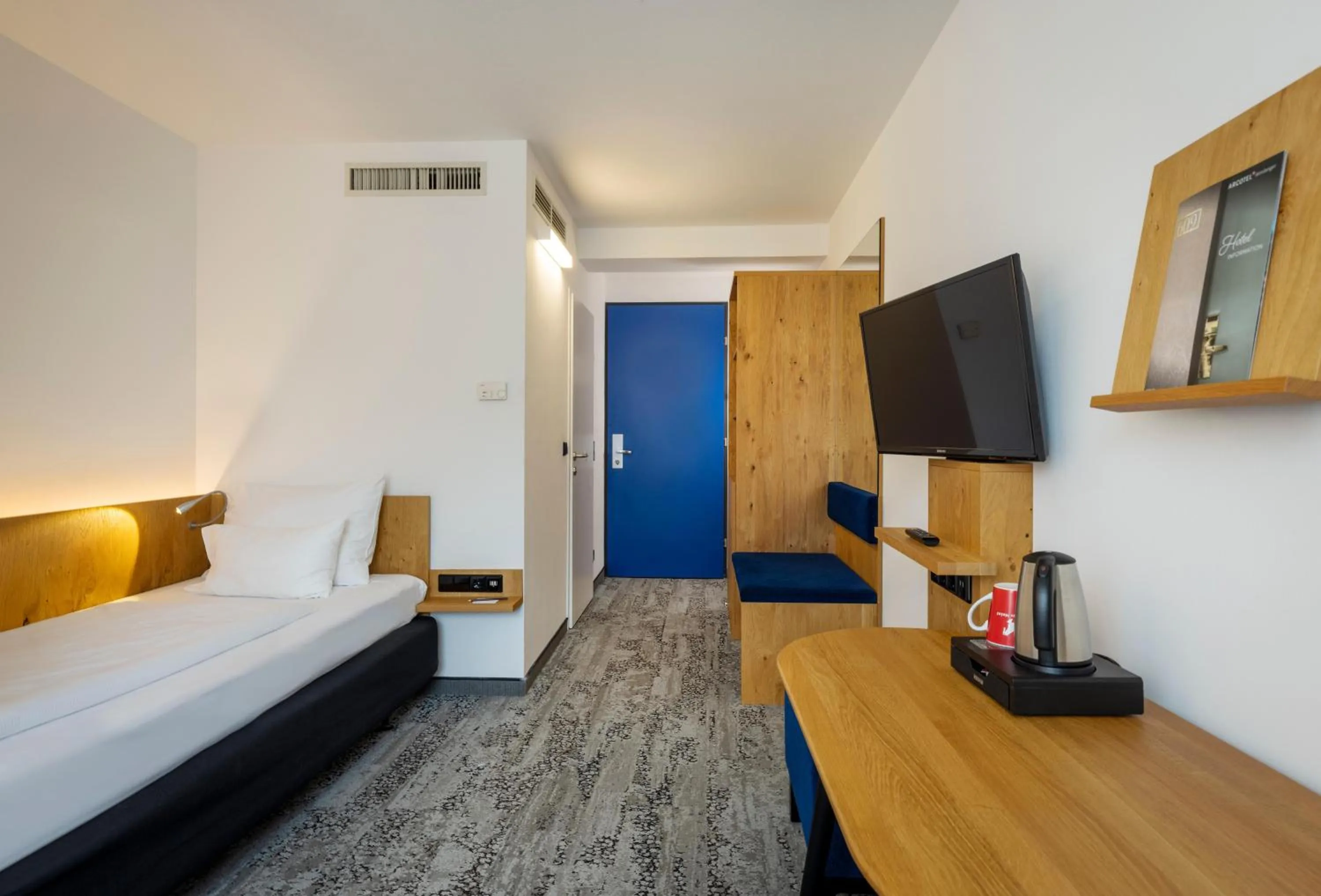 Photo of the whole room, Bed in ARCOTEL Wimberger Wien