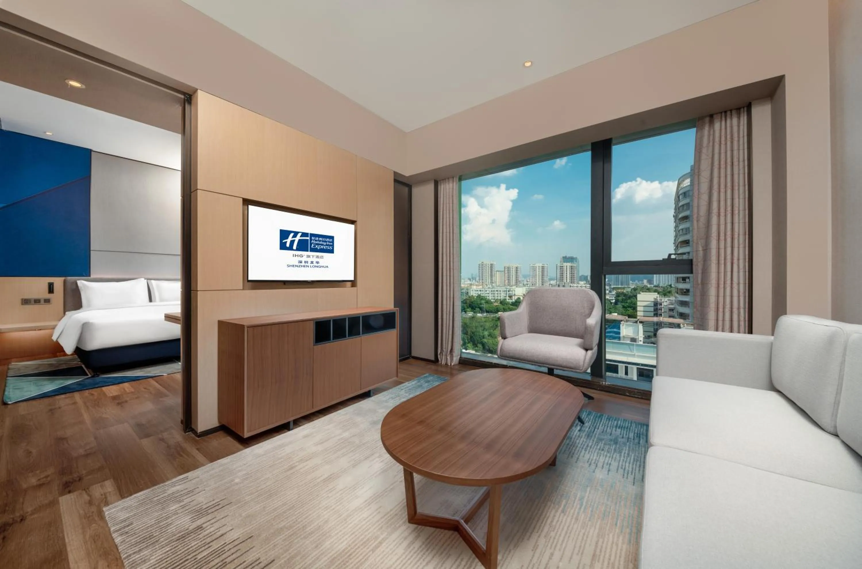 Living room, Bed in Holiday Inn Express Shenzhen Longhua by IHG