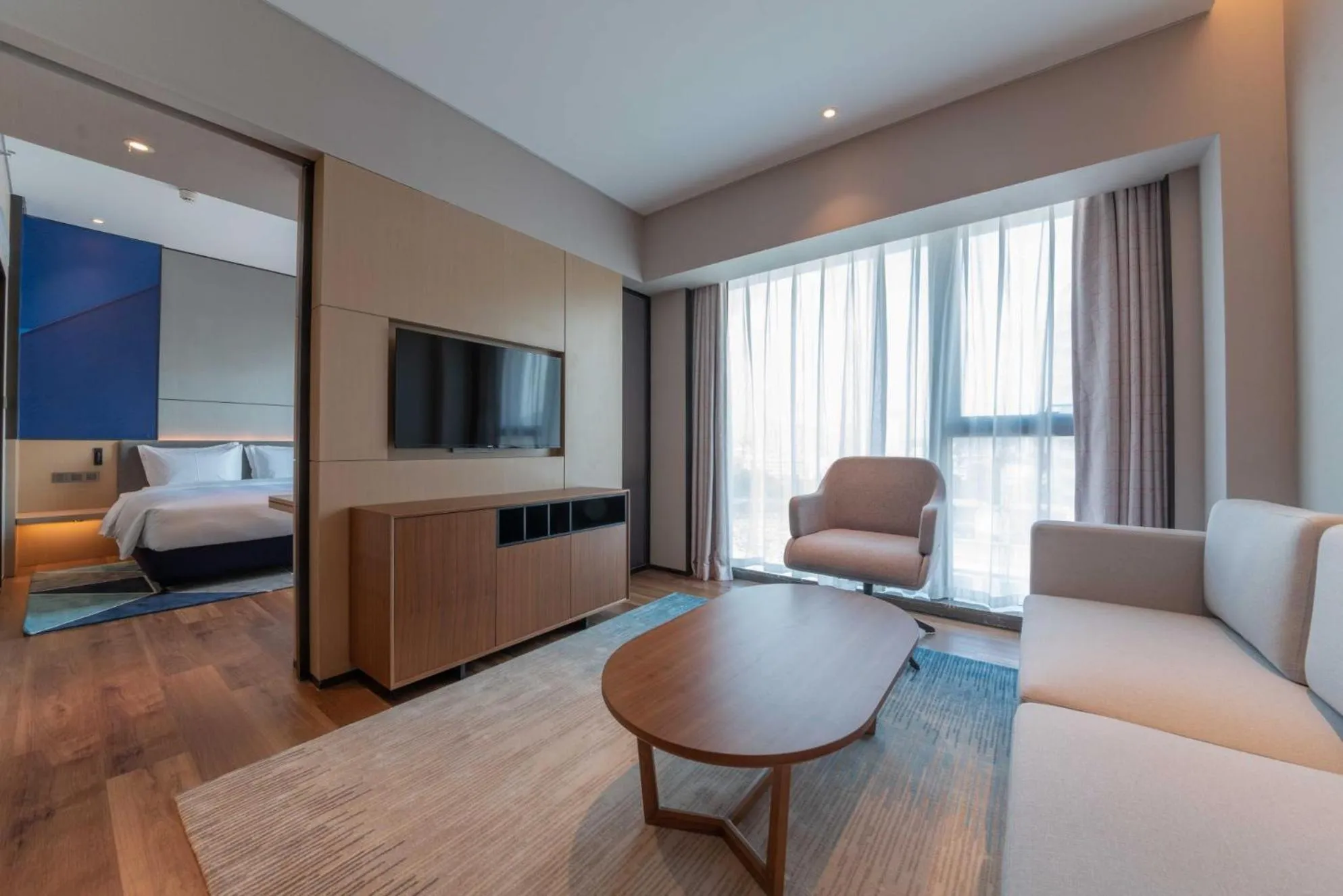 Living room, Bed in Holiday Inn Express Shenzhen Longhua by IHG