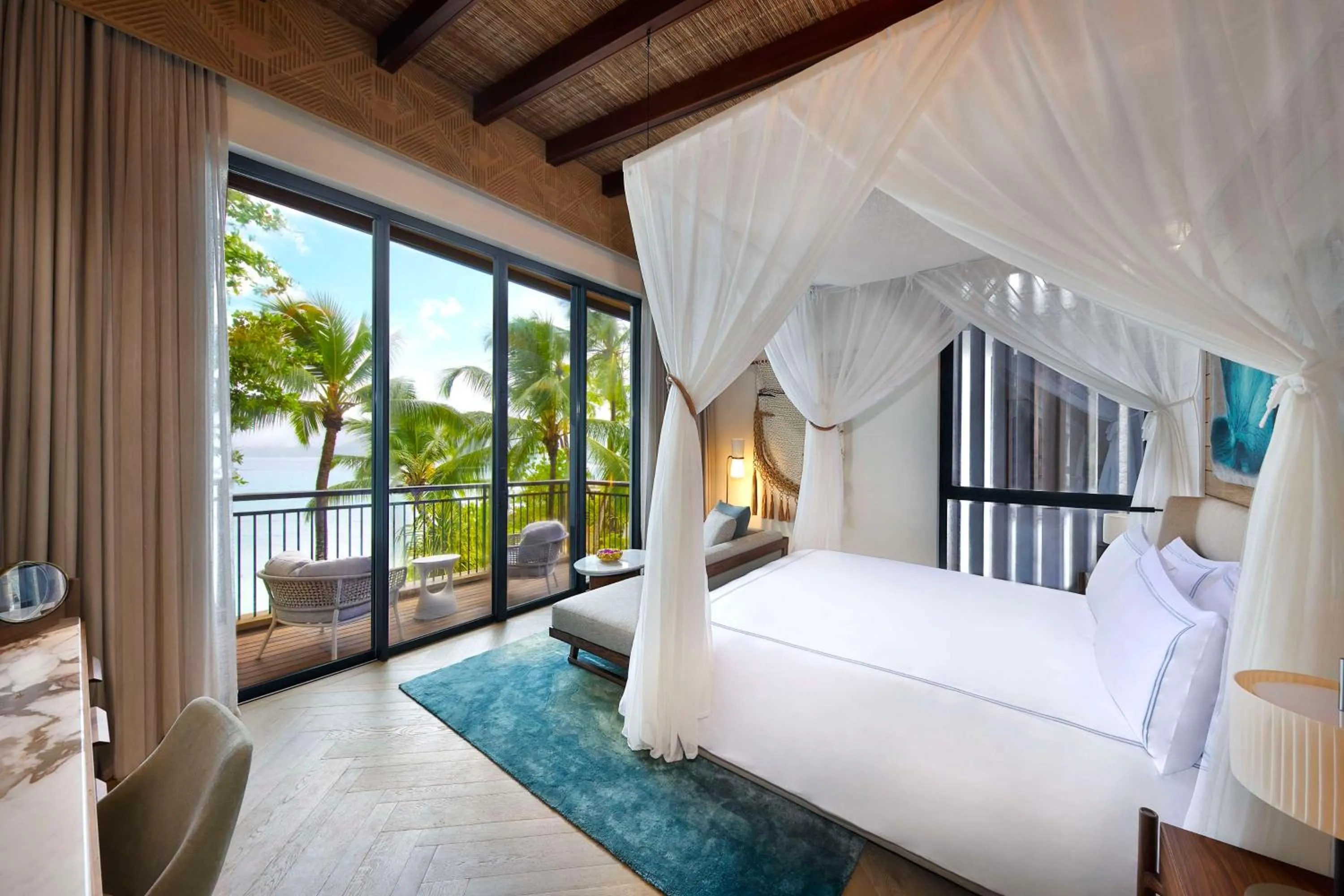Bed in Mango House Seychelles, LXR Hotels & Resorts