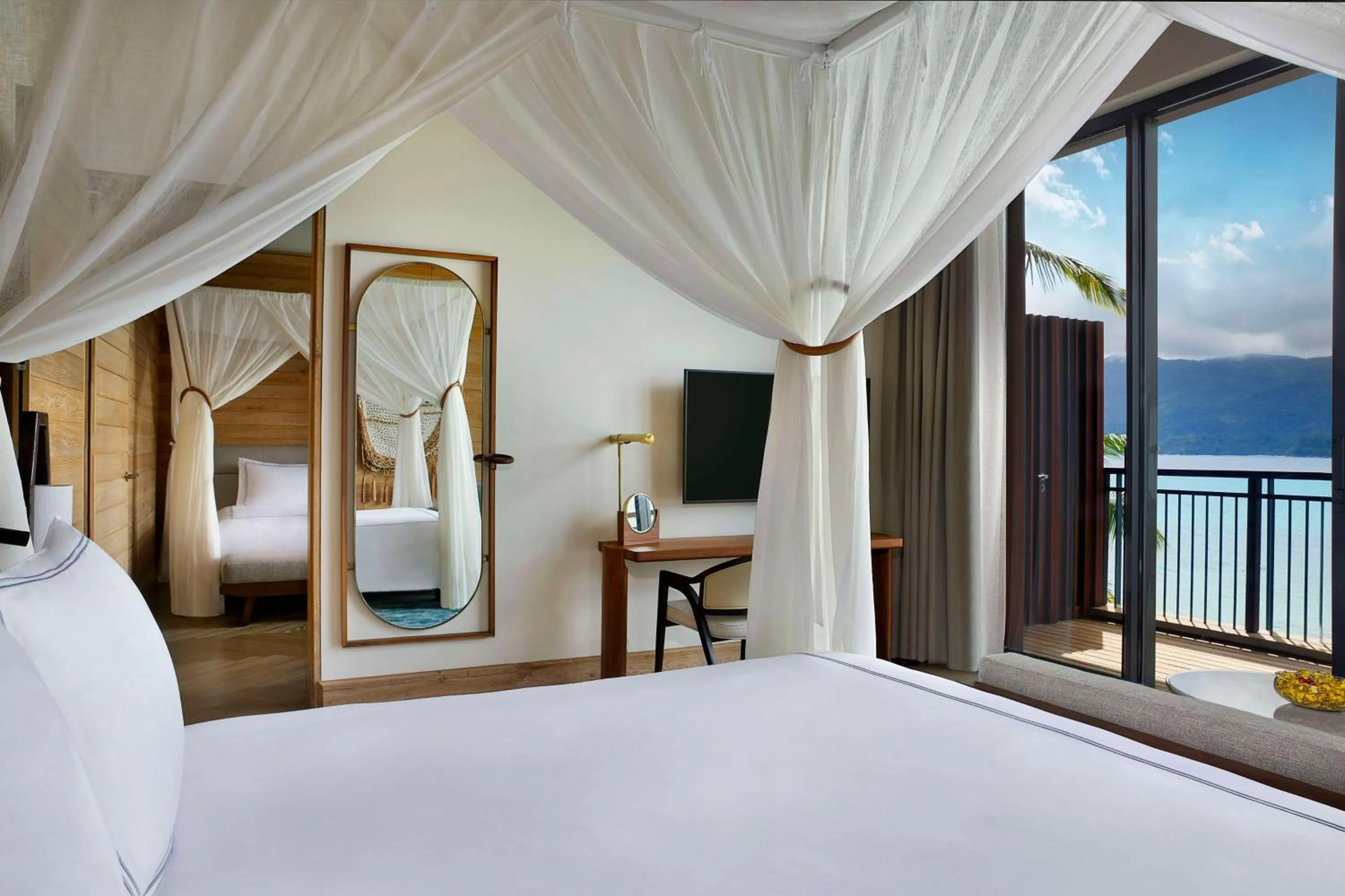 Bed in Mango House Seychelles, LXR Hotels & Resorts