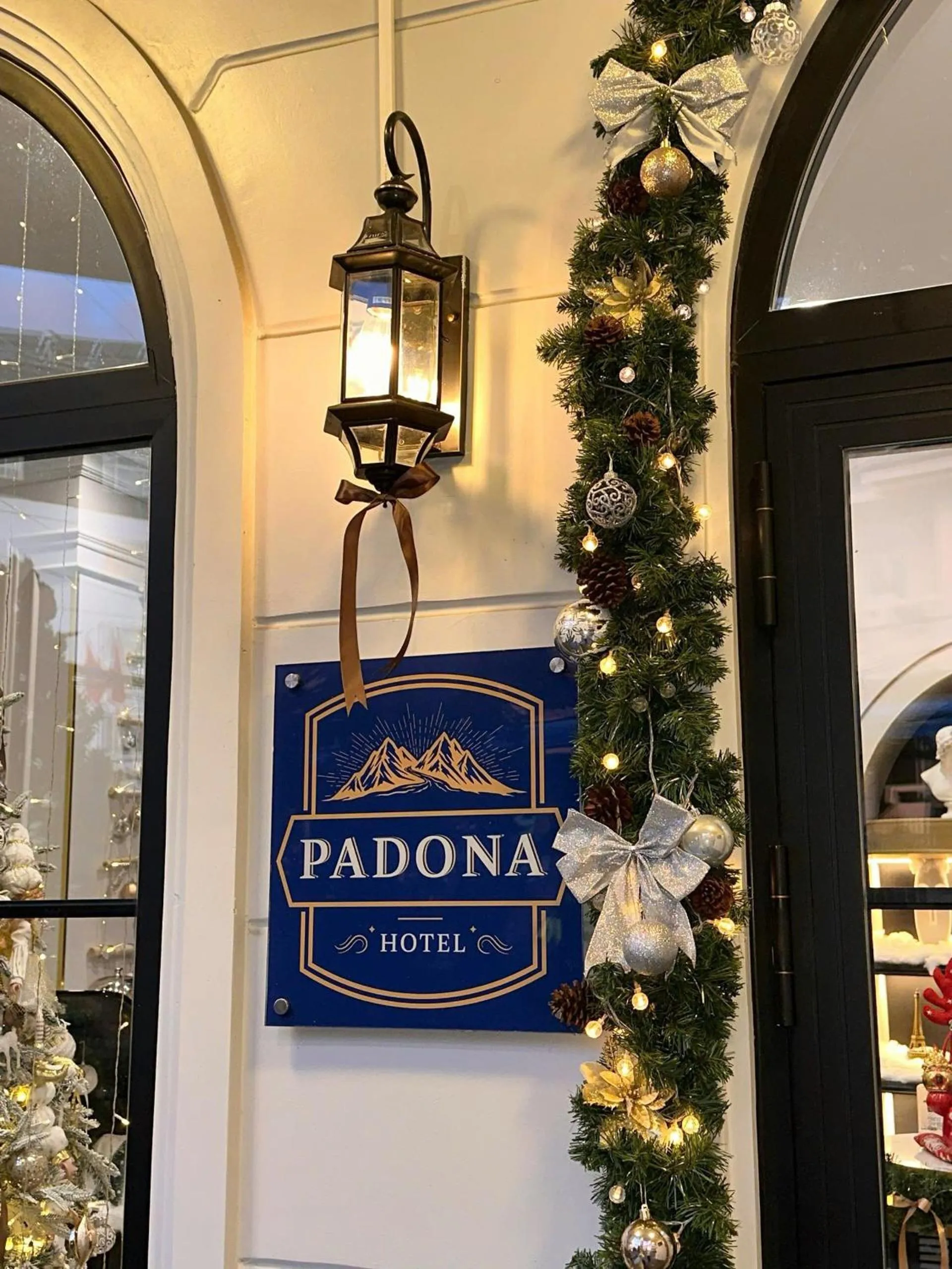 Property logo or sign in Padona Hotel