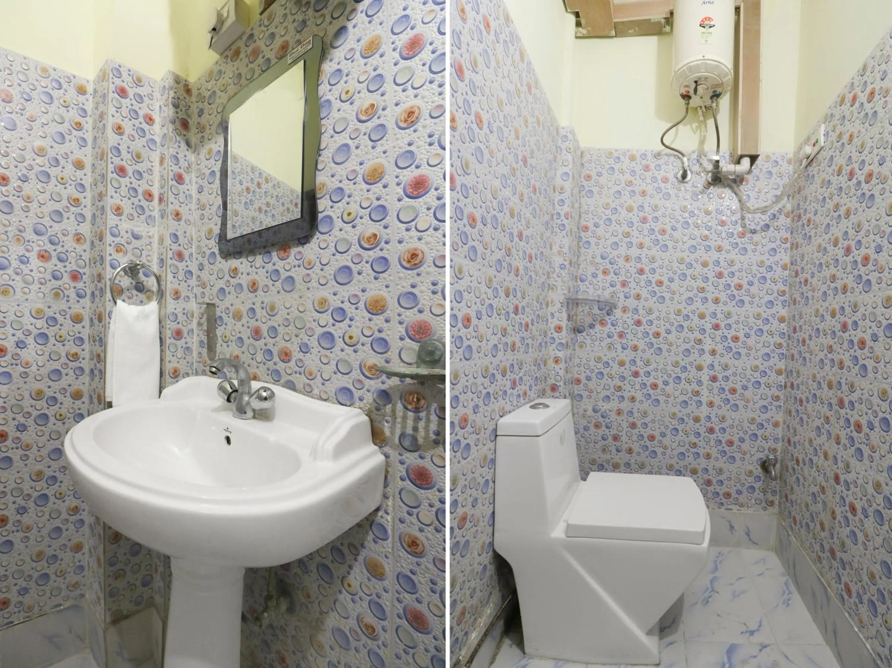 Bathroom in Hotel O Home Cozy Studio Collage Square Hotel Maya International Near St. Thomas's Church