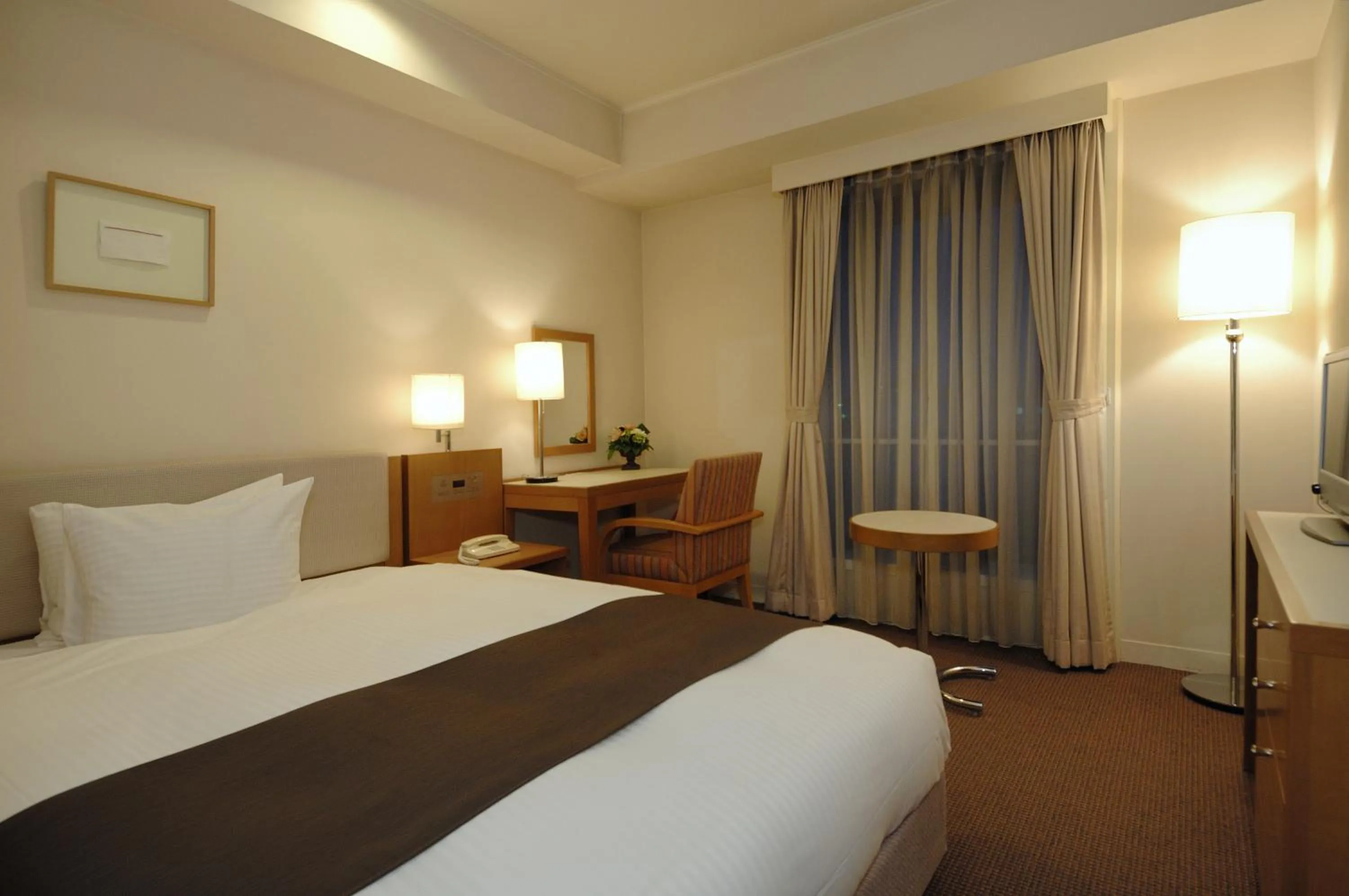 Bed in Rembrandt Hotel Atsugi
