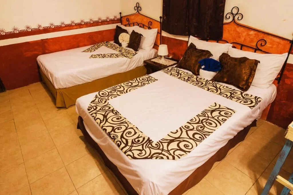 Bed in Private Beachhouse Hacienda Antigua