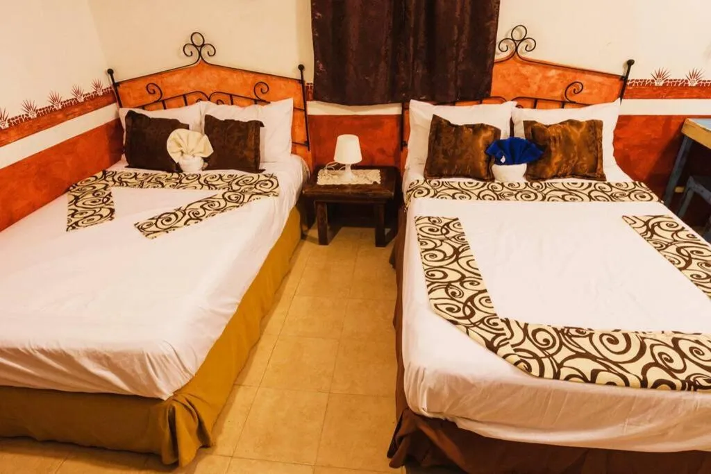 Bed in Private Beachhouse Hacienda Antigua