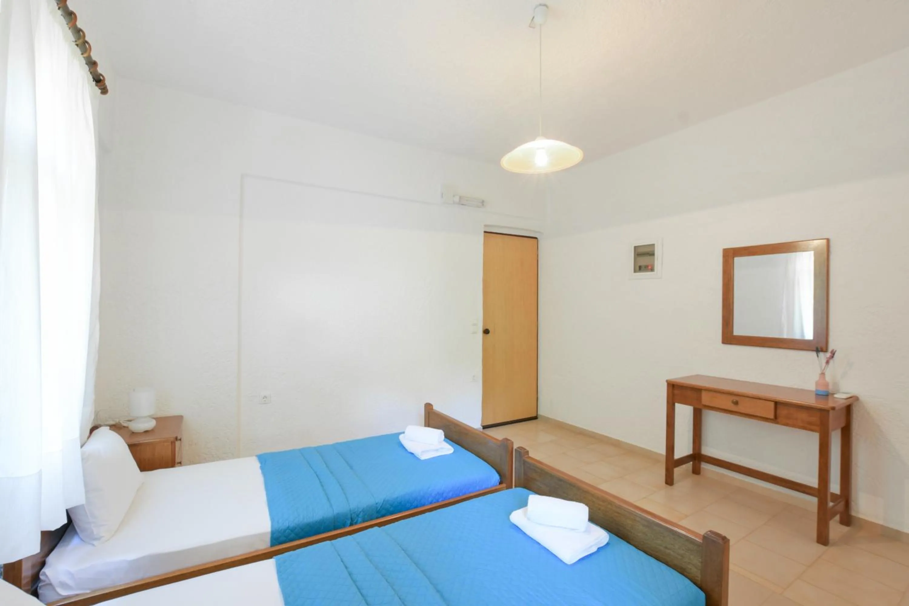 Bed in Galini Apartments