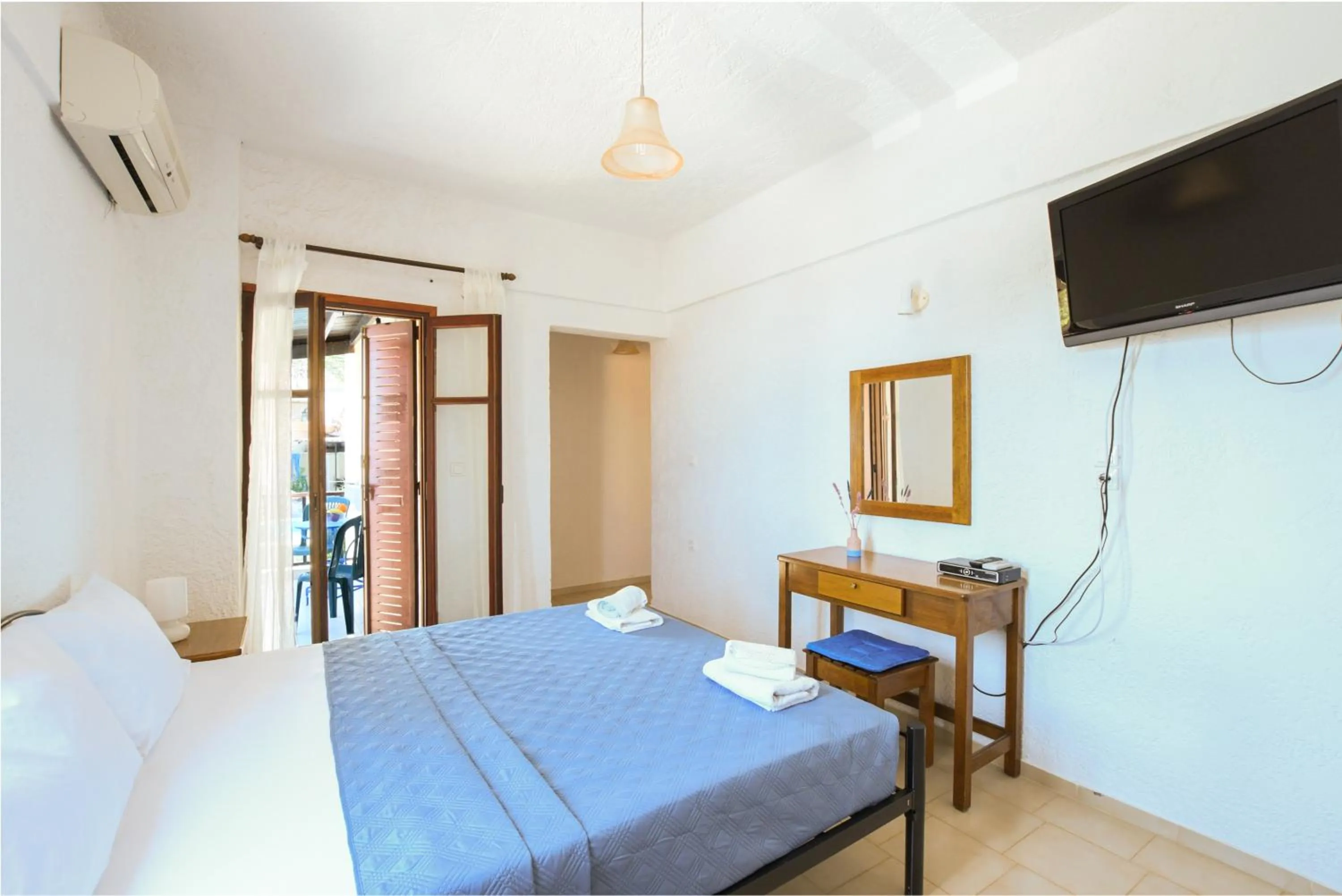 Bed in Galini Apartments