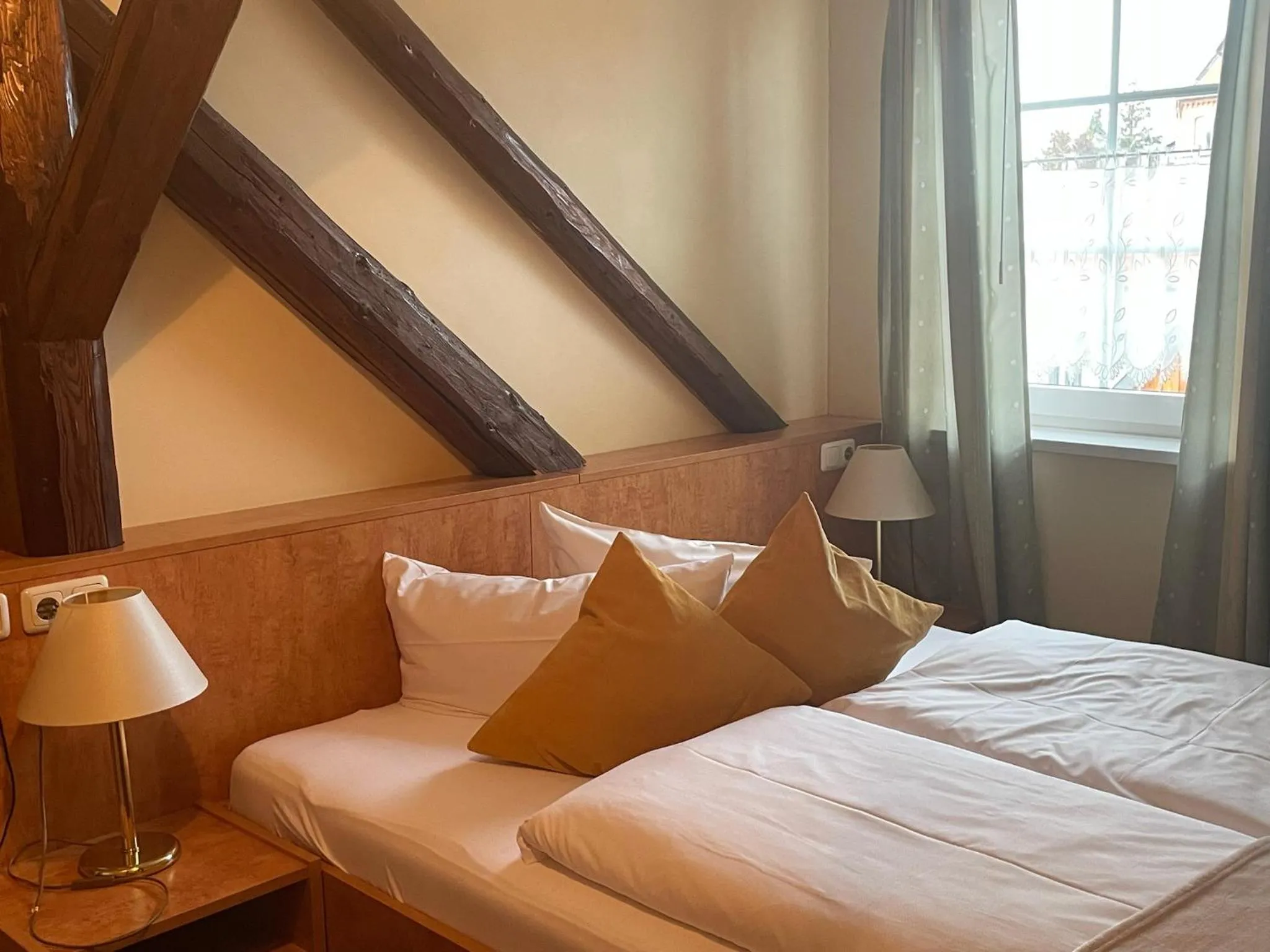 Bed in Harzhotel Warnstedter Krug