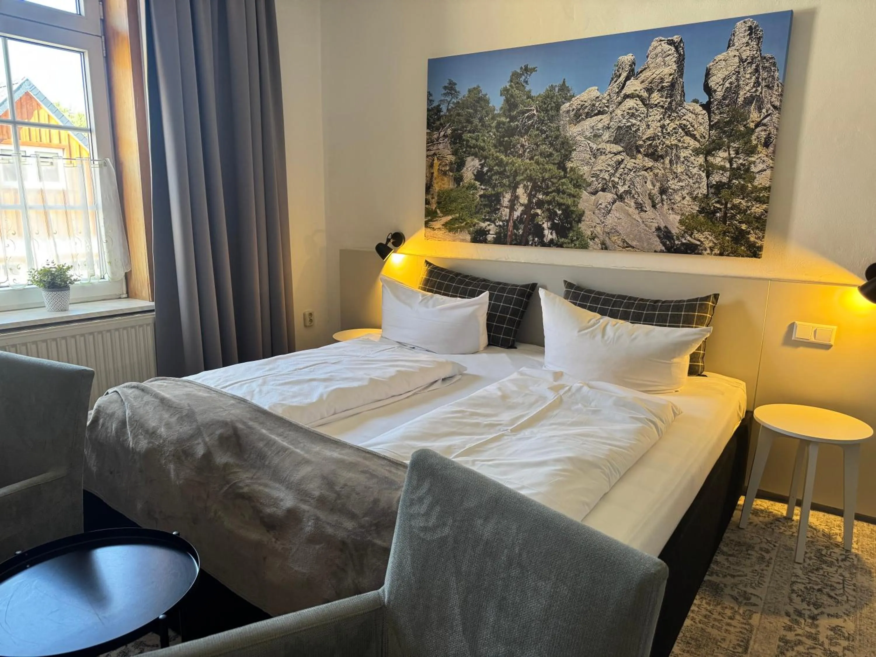 Bed in Harzhotel Warnstedter Krug