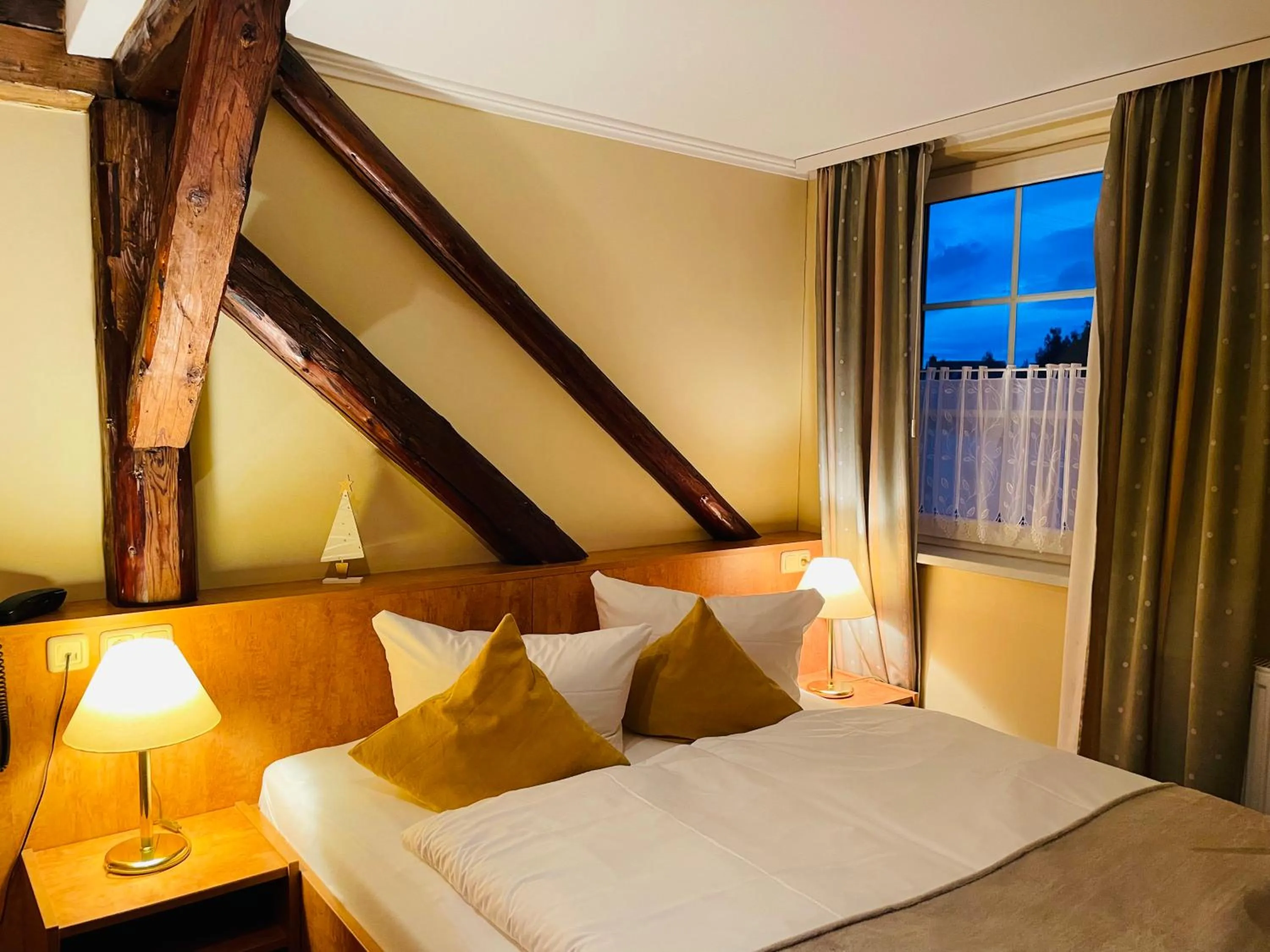 Photo of the whole room, Bed in Harzhotel Warnstedter Krug