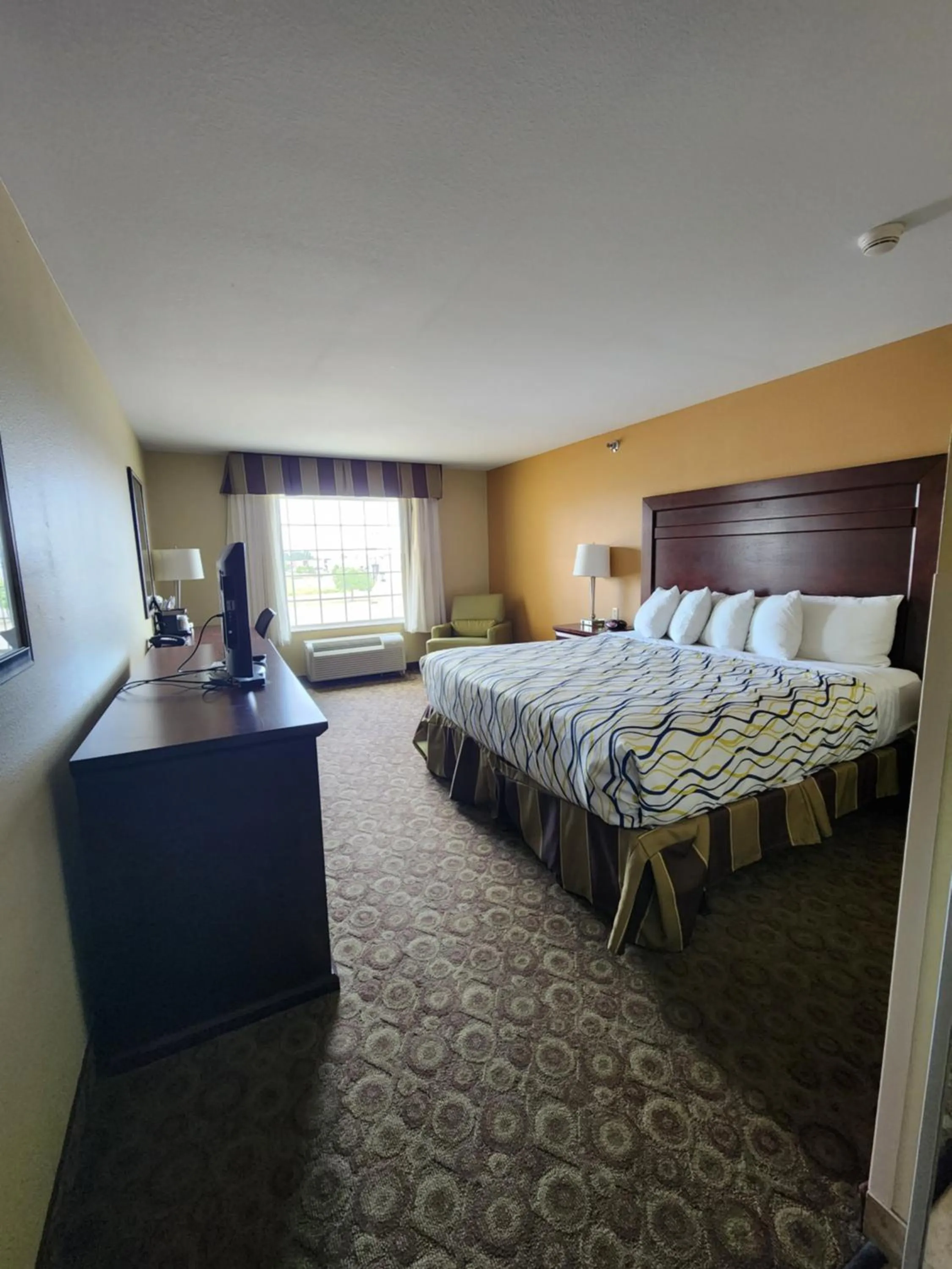 Bed in Highland Suites Minot