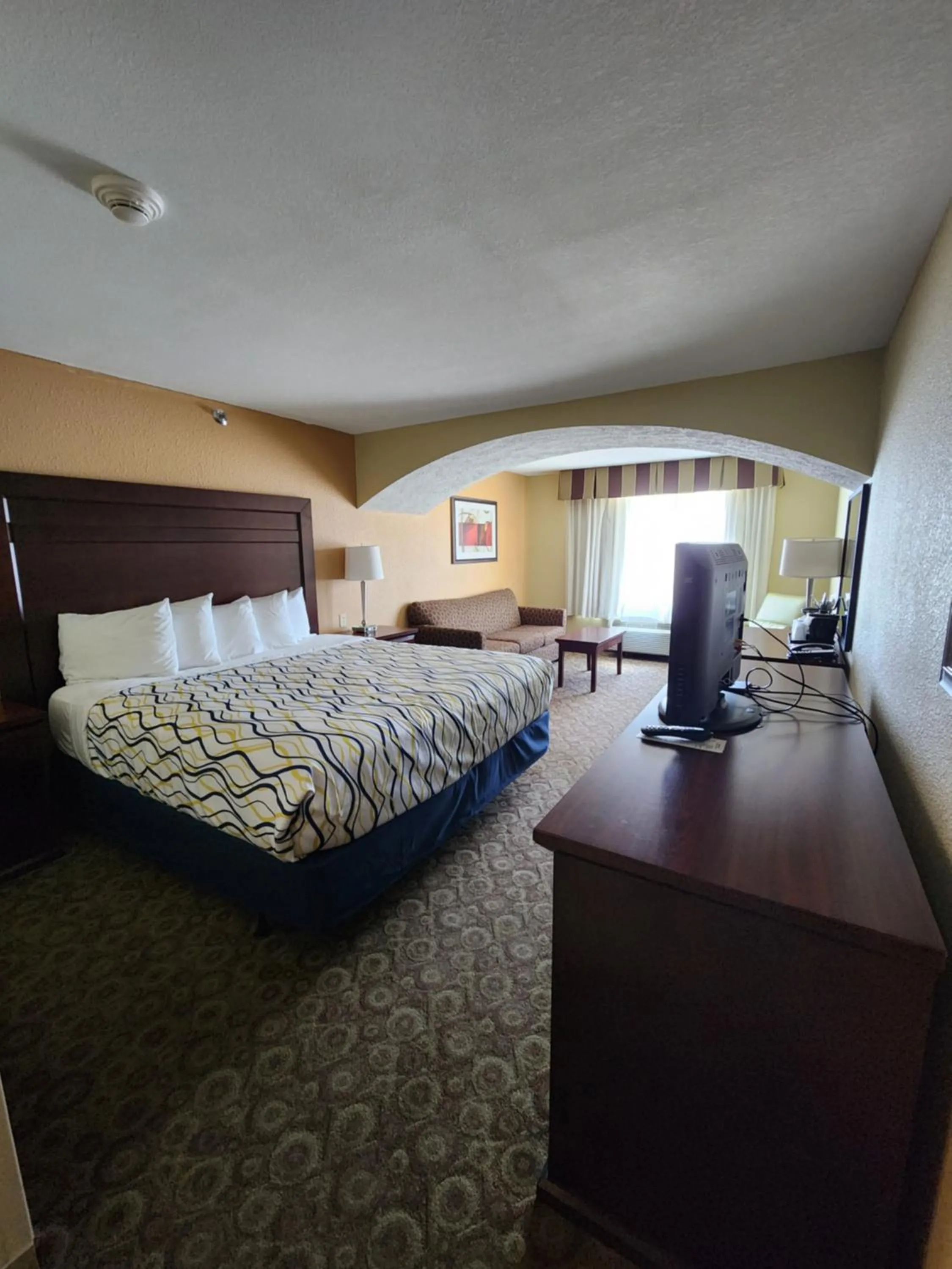 Bed in Highland Suites Minot