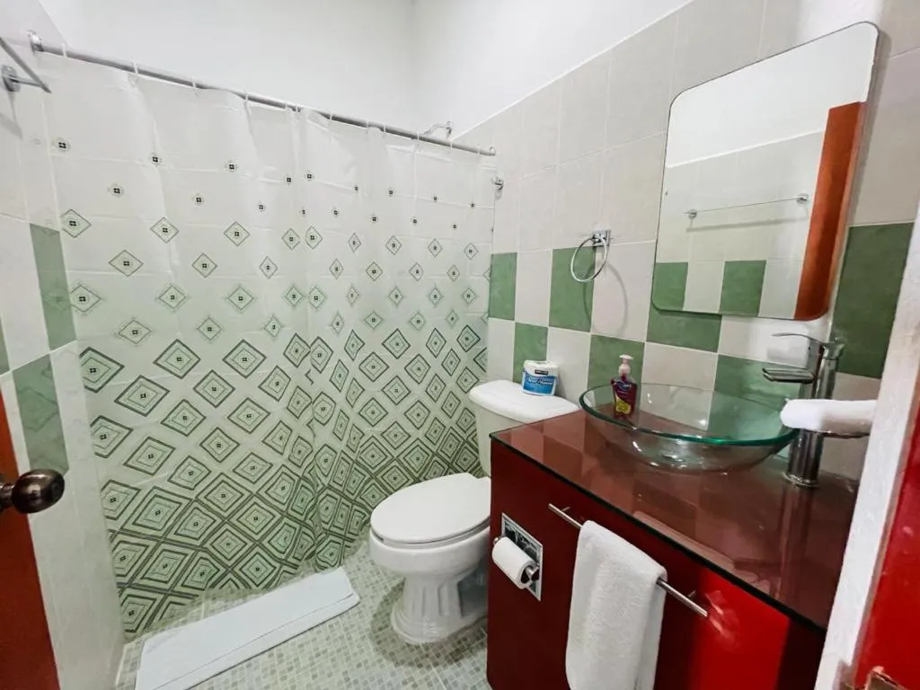 Bathroom in Habitación Amanecer Turquesa #5