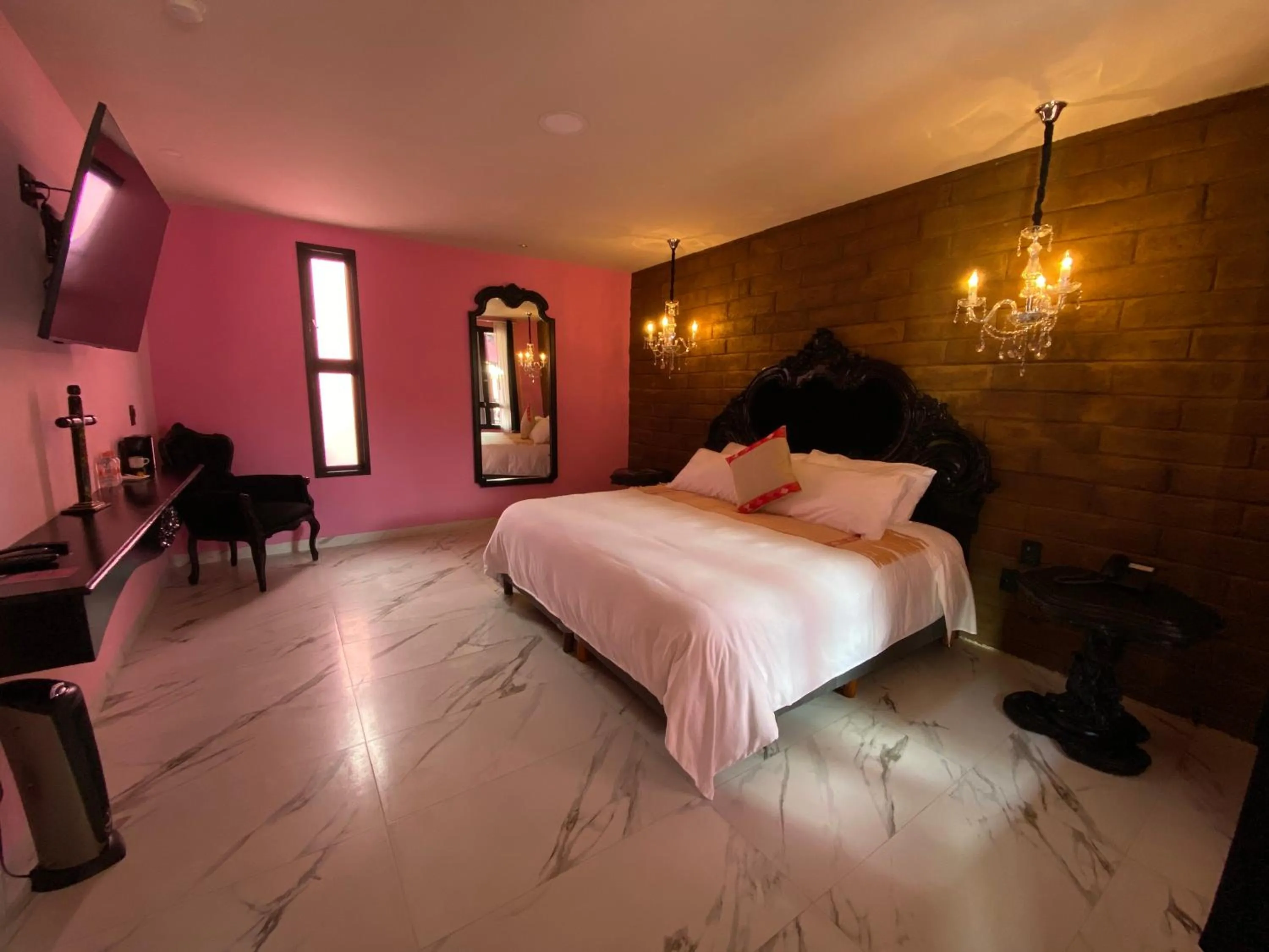 Bed in Casa Rosa Hotel & Spa