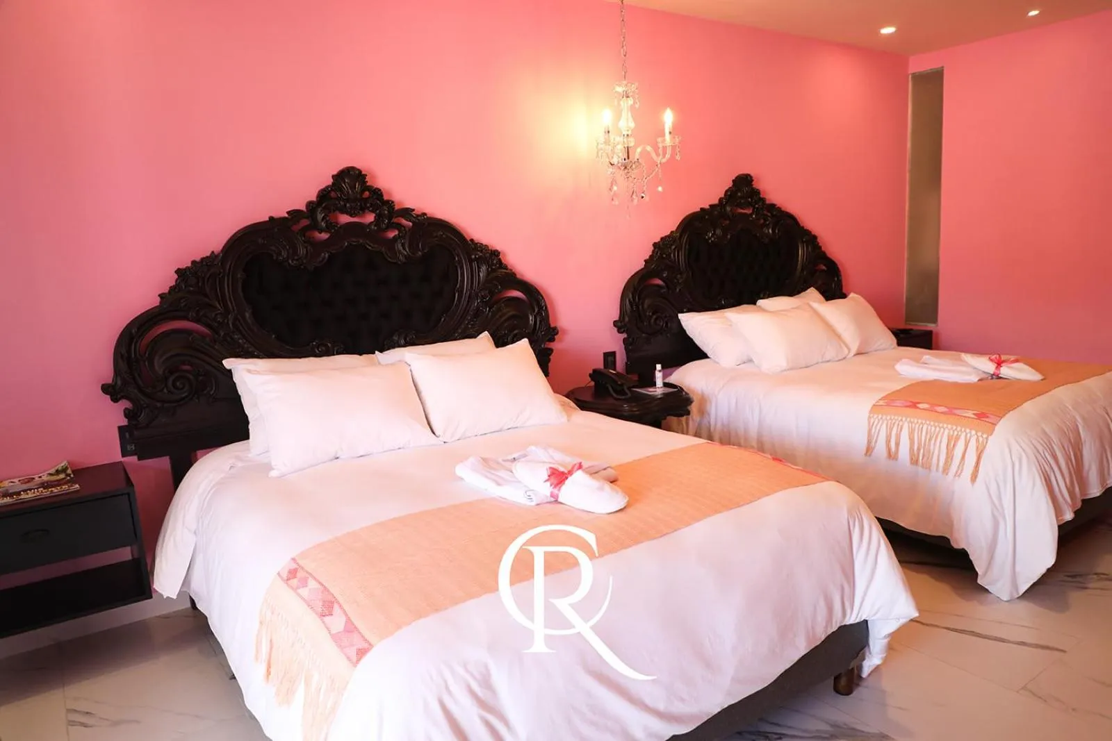 Bed in Casa Rosa Hotel & Spa