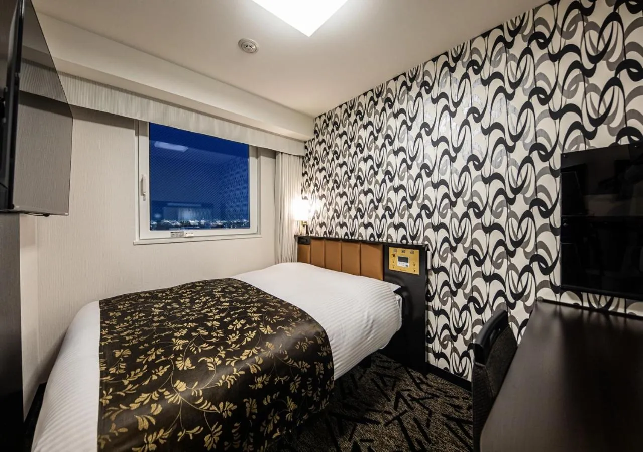 Photo of the whole room, Bed in APA Hotel & Resort Hakata Ekihigashi