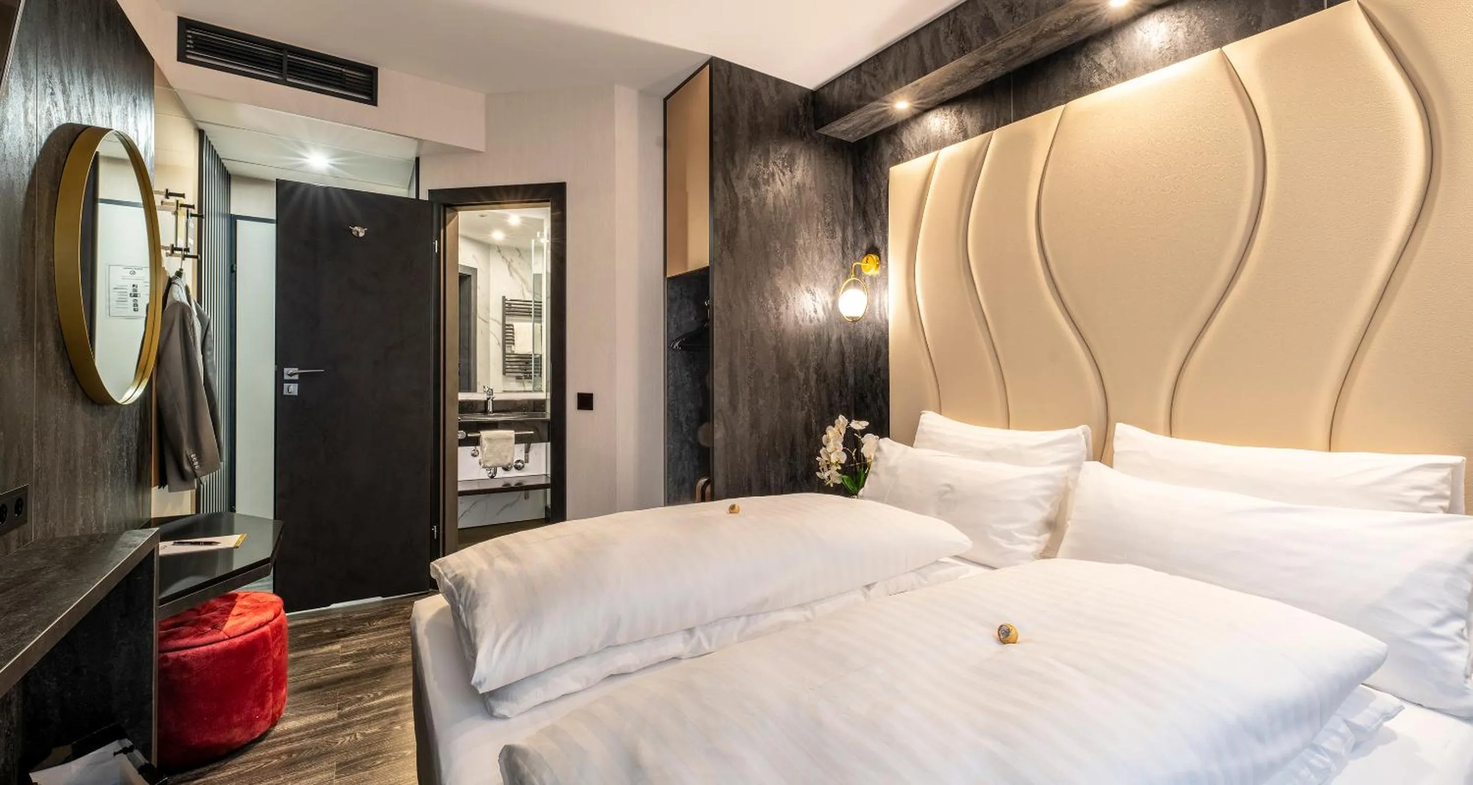 Bed in PLAZA INN Salzburg City