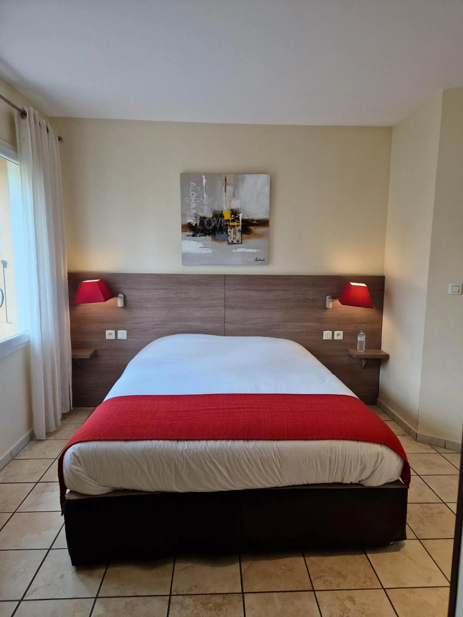 Bed in Hôtel Restaurant Logis Le Relais du Vivarais