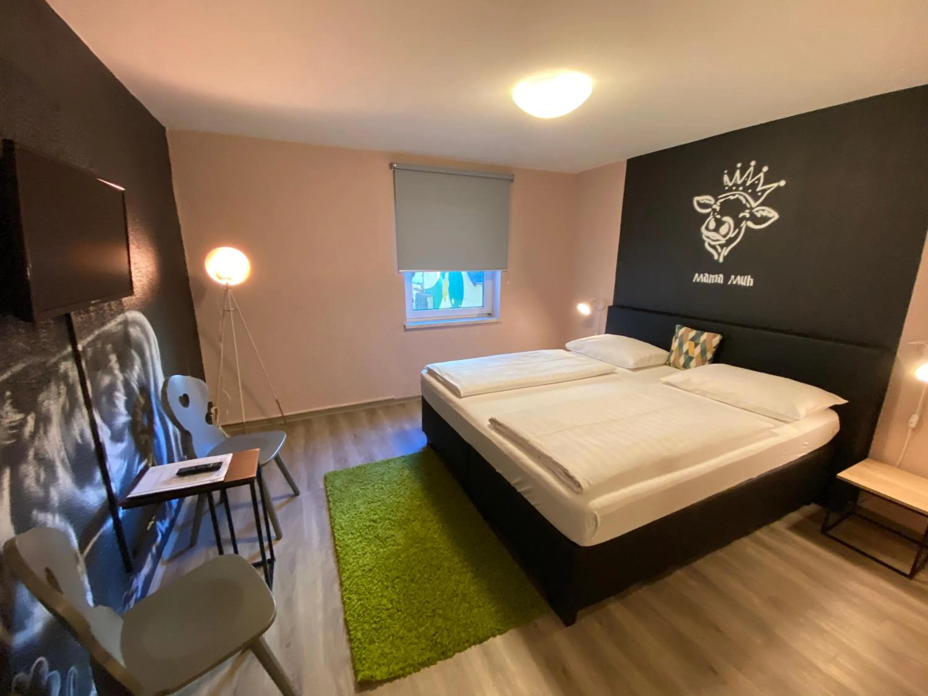 Photo of the whole room, Bed in Mama Muh Self-Check-in