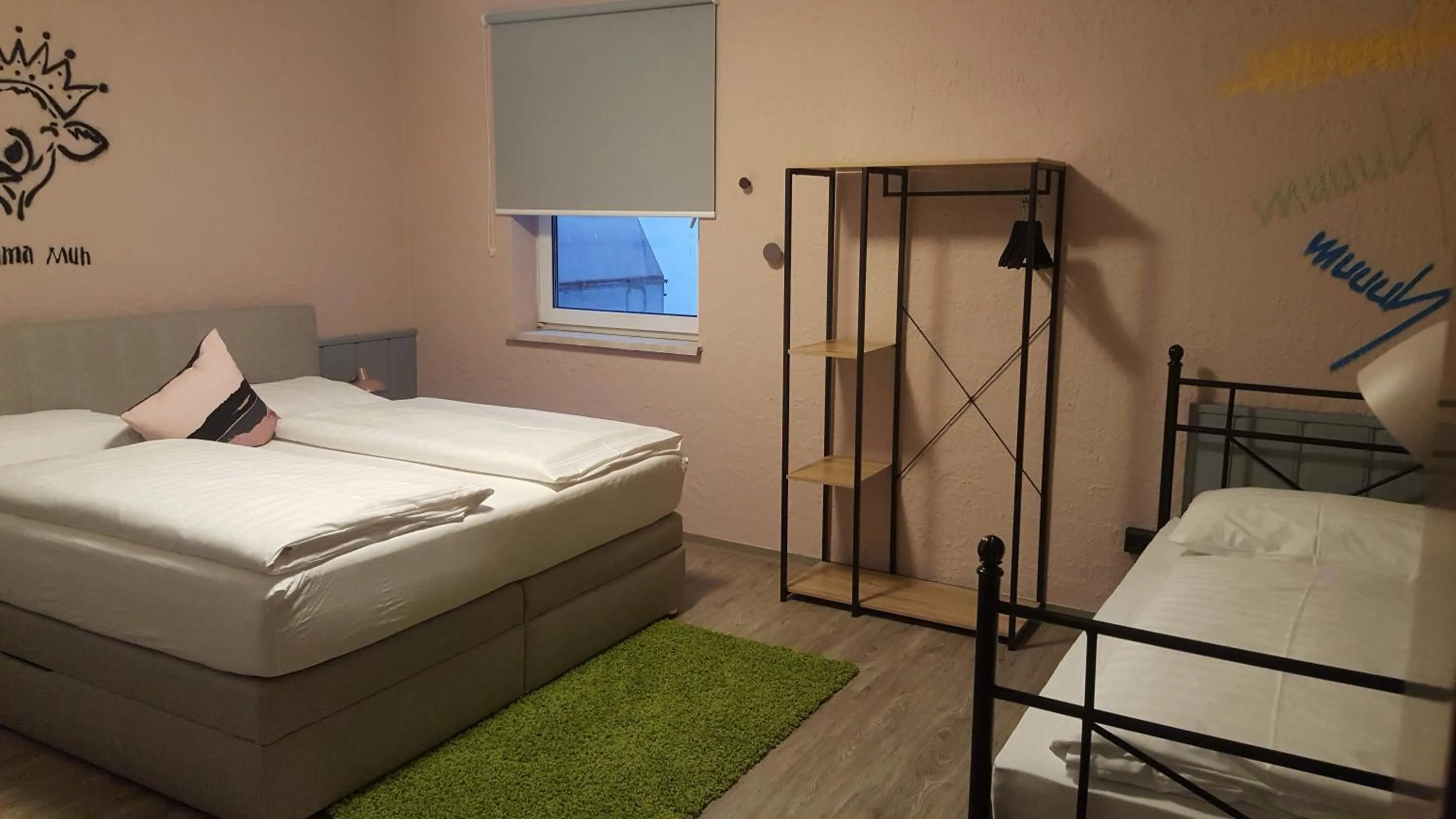 Photo of the whole room, Bed in Mama Muh Self-Check-in