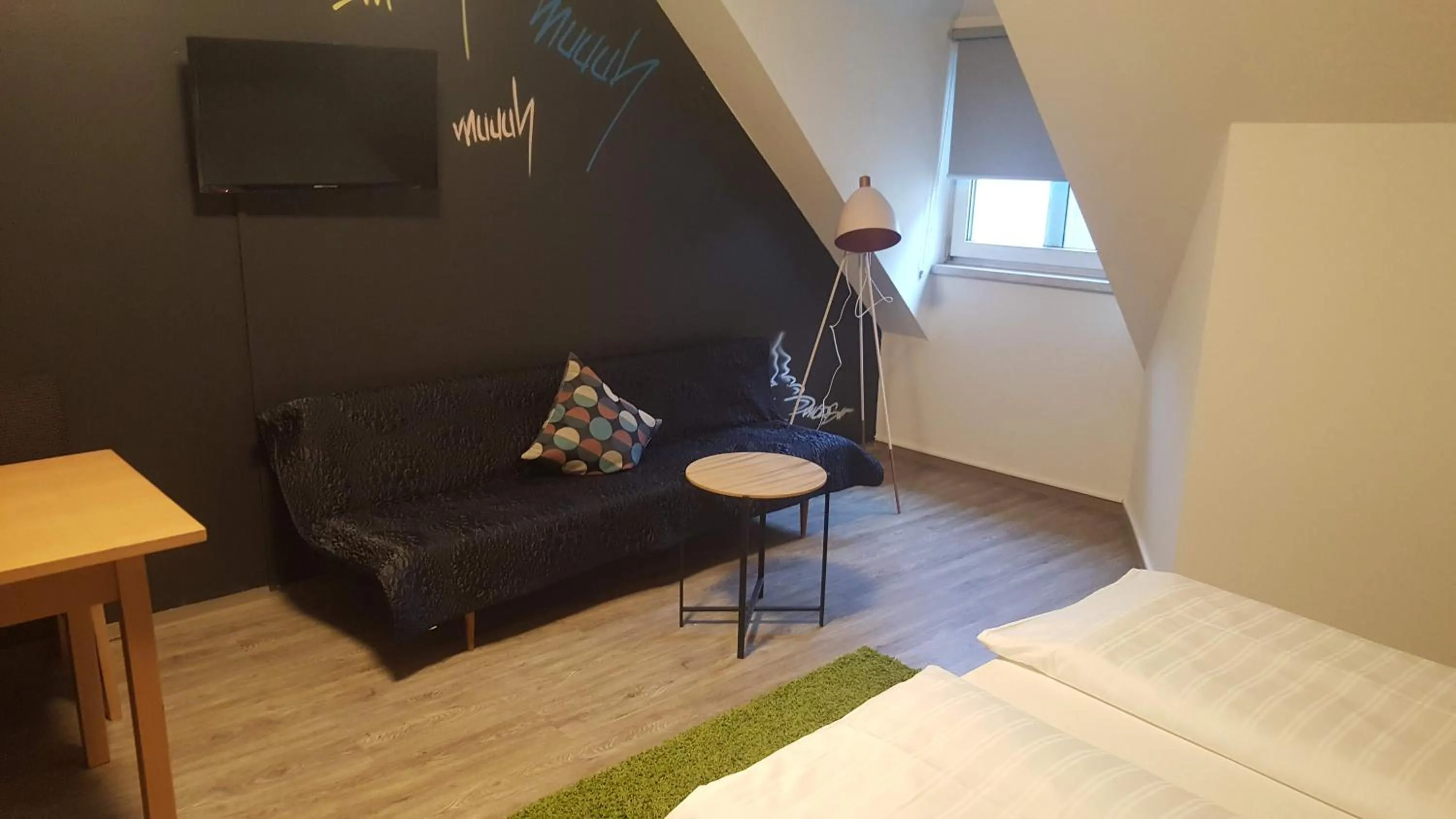 Photo of the whole room, Bed in Mama Muh Self-Check-in