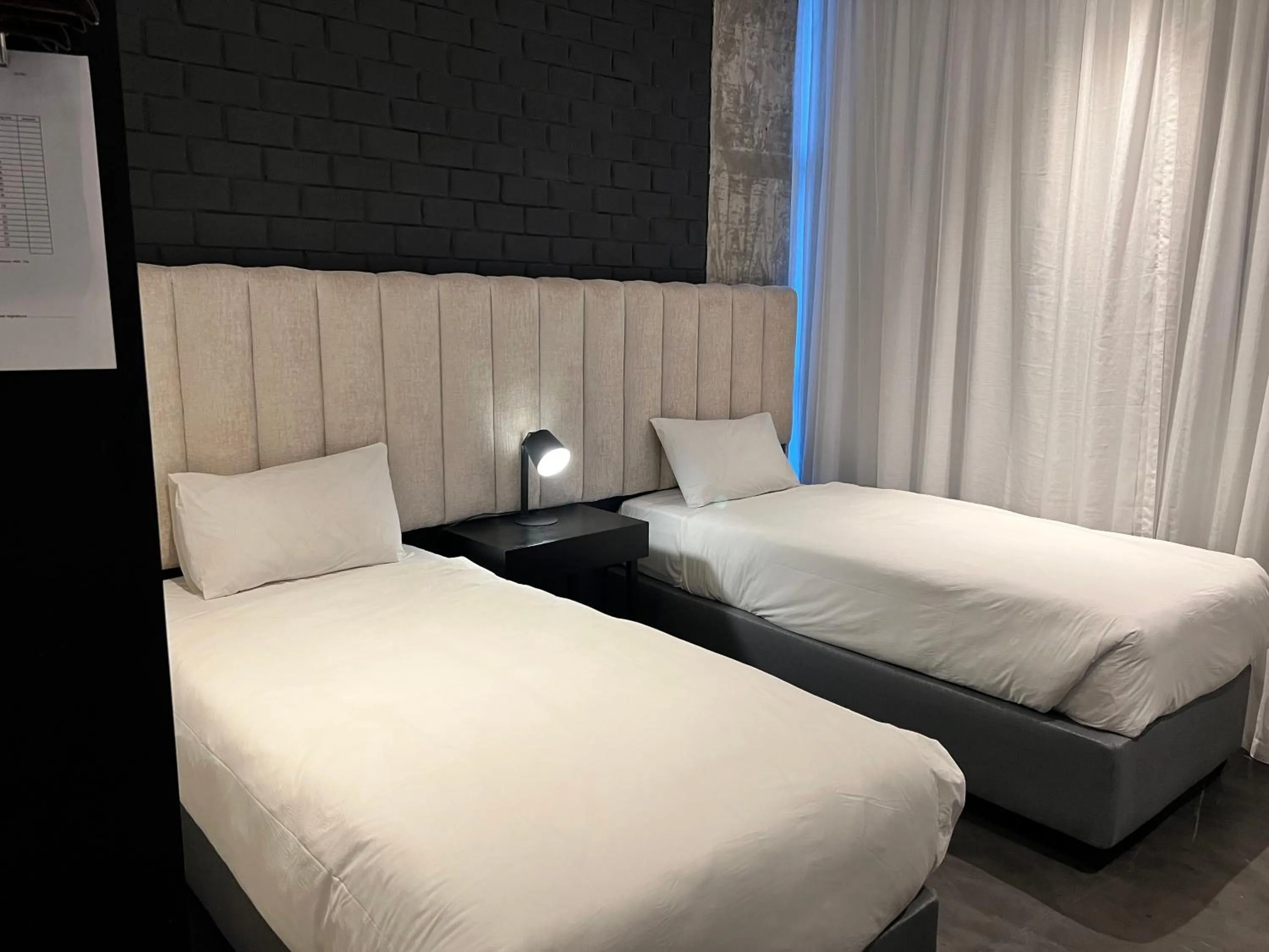 Bed in The Urban Hotel Lusaka