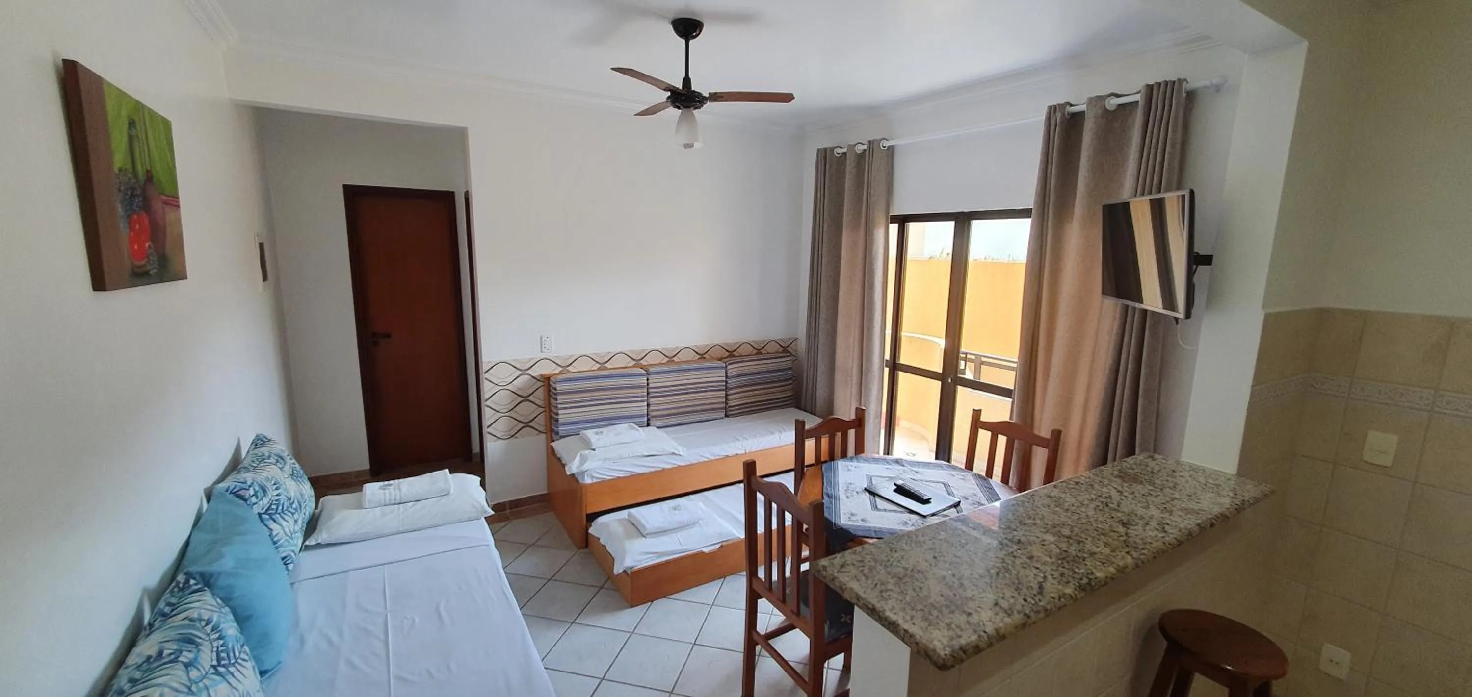 Living room, Bed in Pousada Vale Del Sol