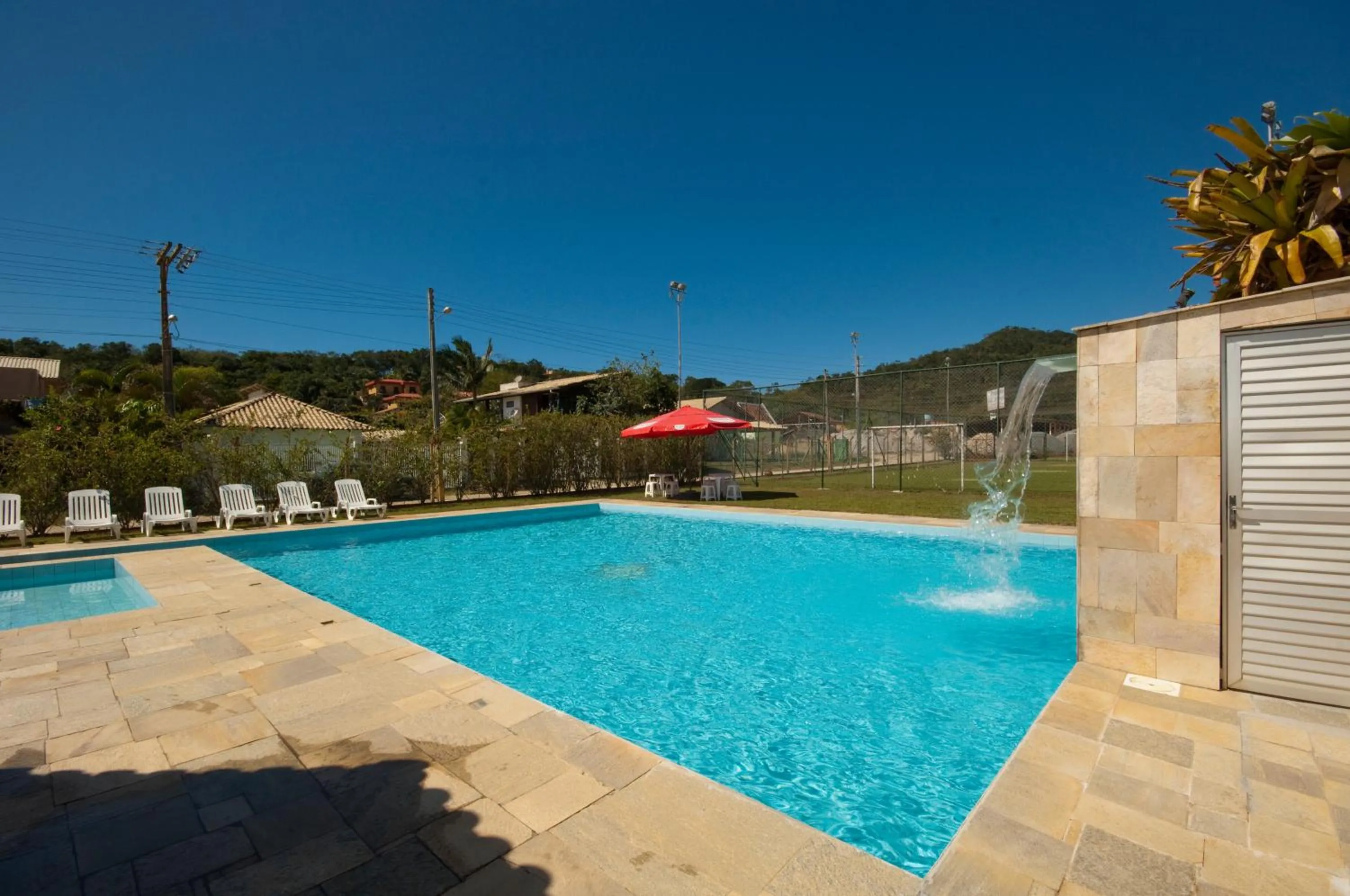 Swimming pool in Pousada Vale Del Sol