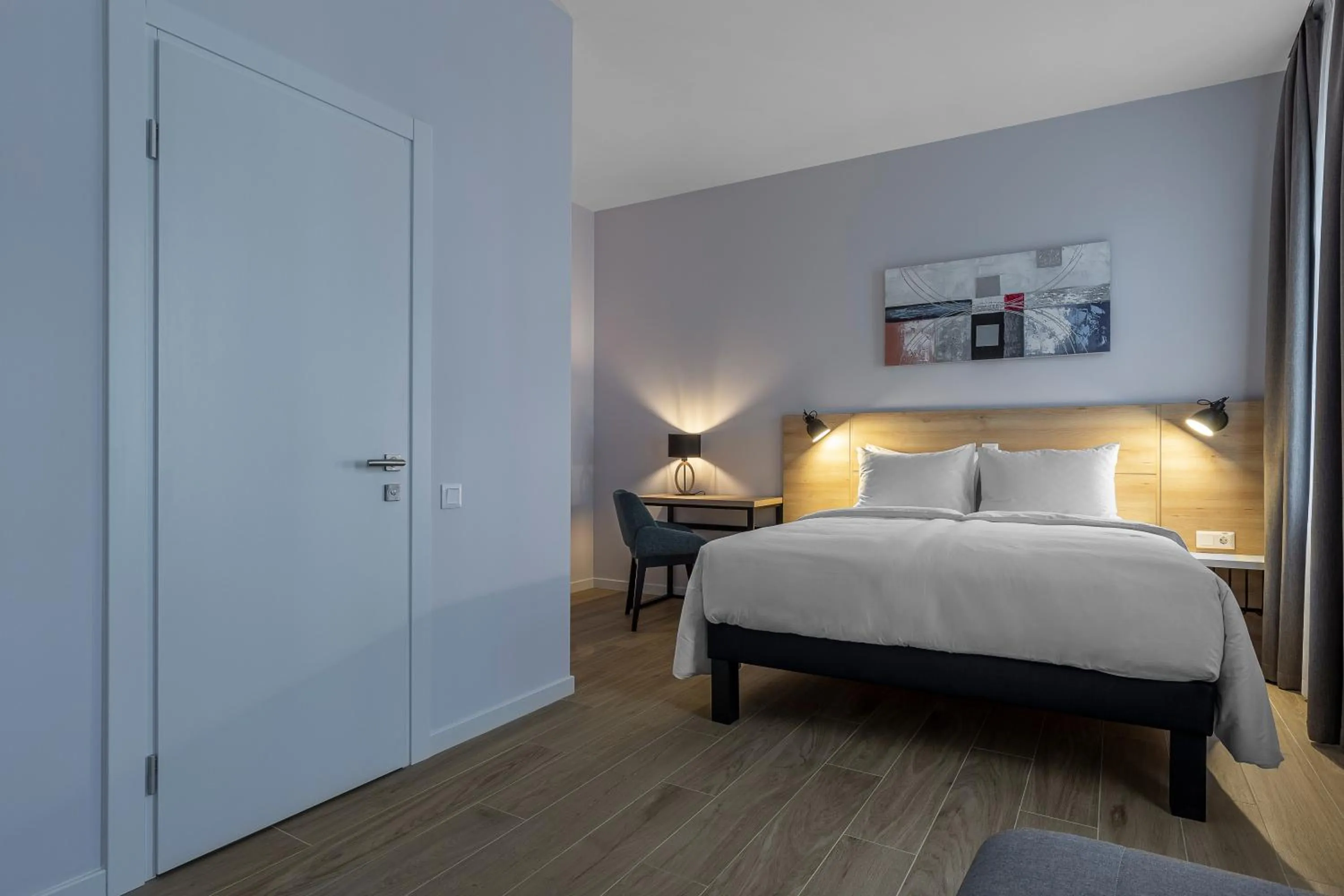 Bed in KONTRAKT Boutique Hotel