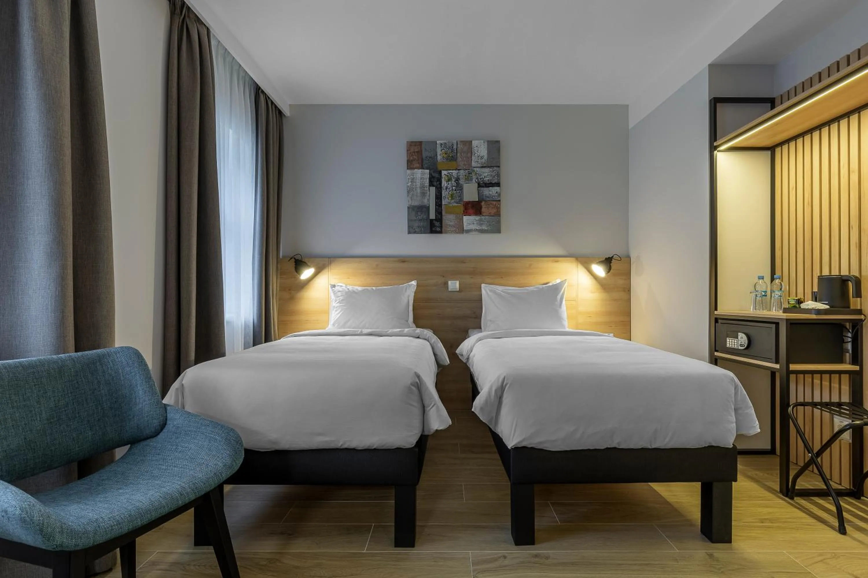 Bed in KONTRAKT Boutique Hotel