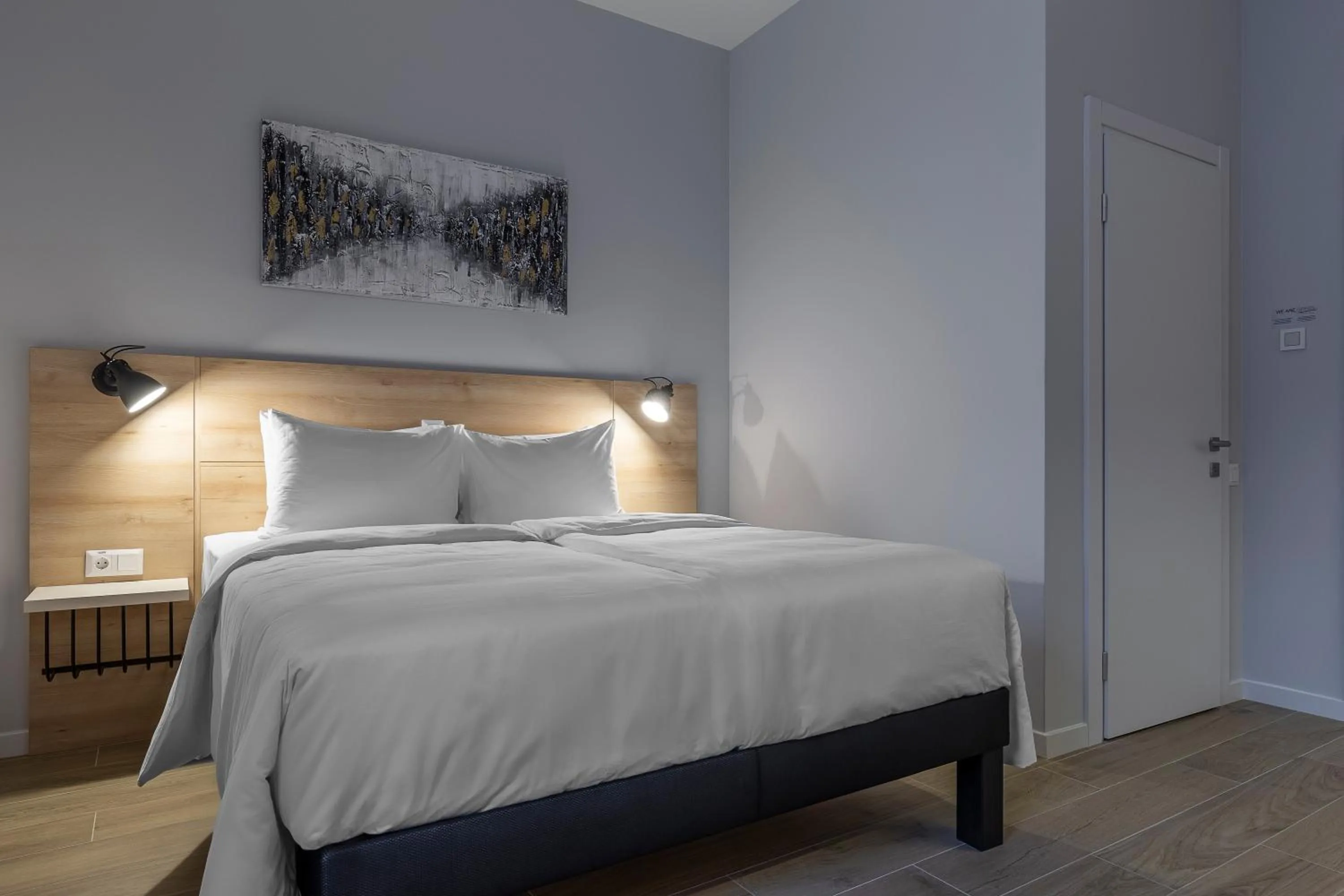 Bed in KONTRAKT Boutique Hotel