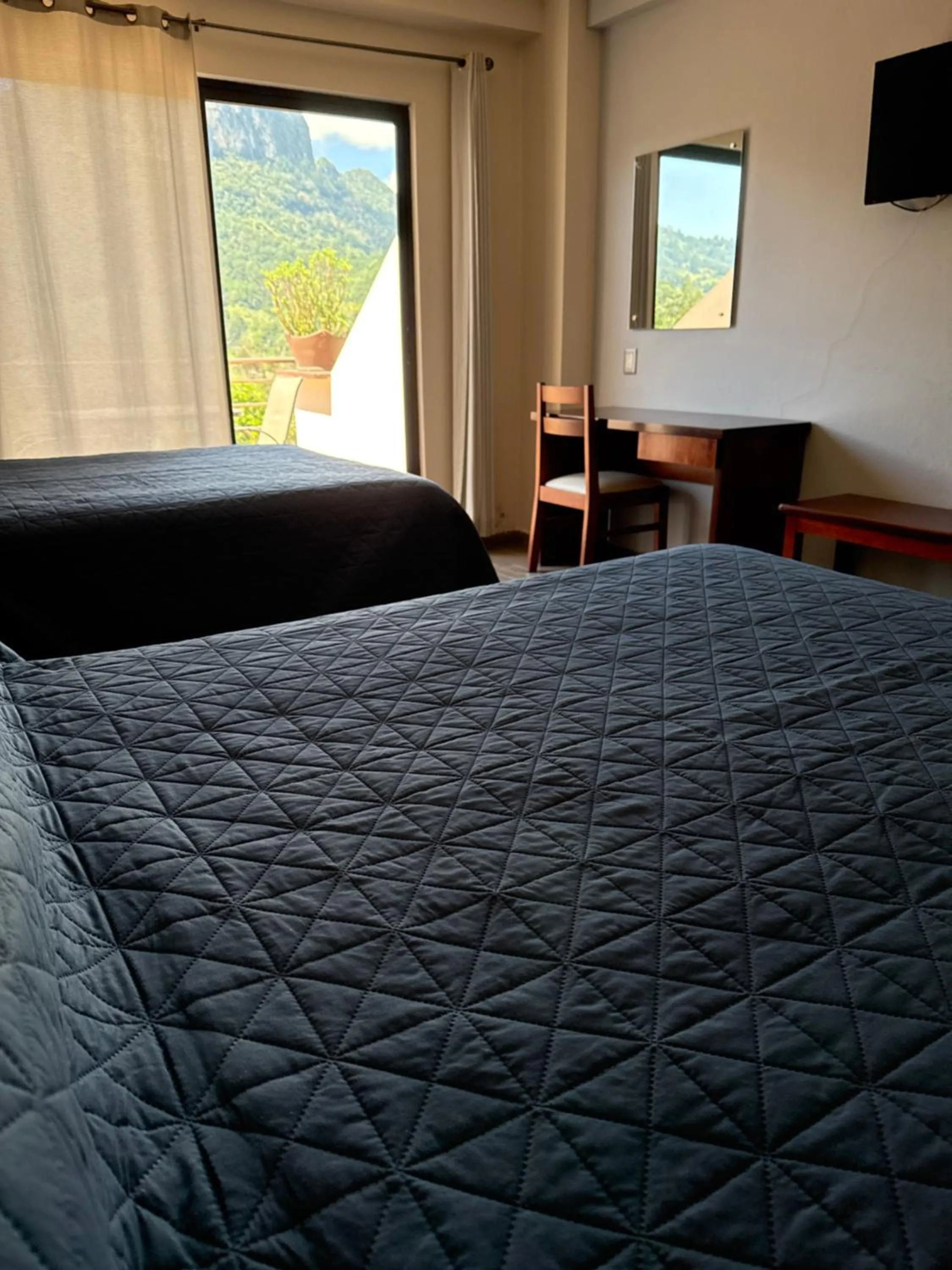 Bed in Hotel Suites Don Miguel