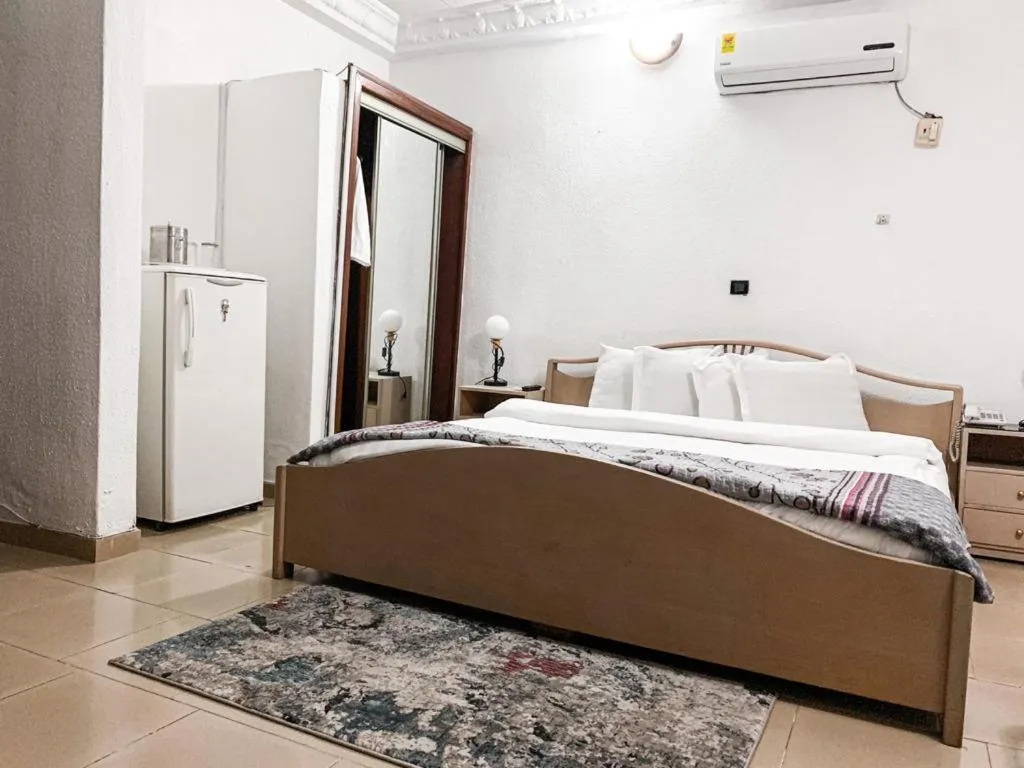 Bed in Hill View Hotel West Airport