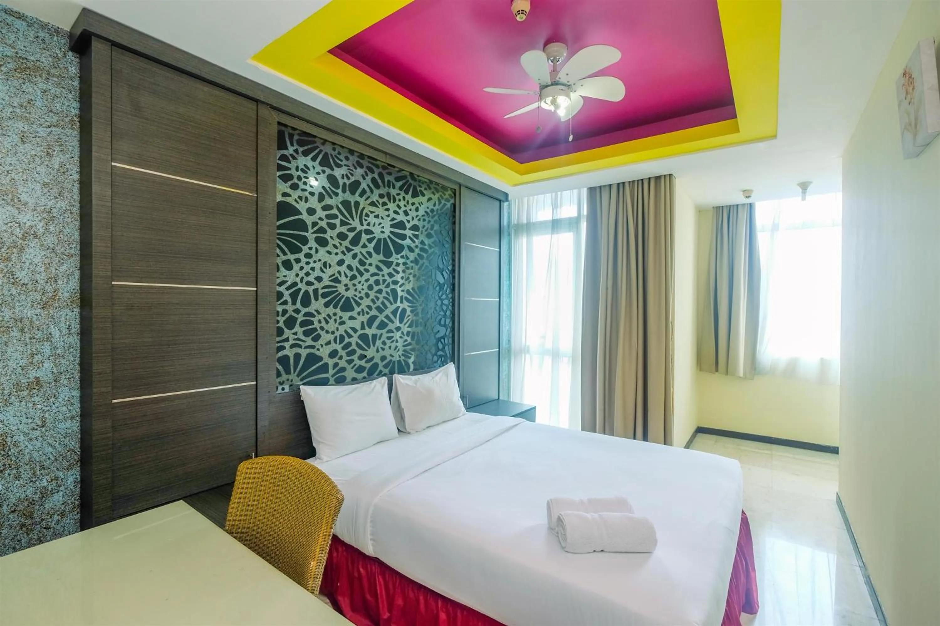 Bed in Exclusive with City View 3BR Apartment Bellagio Residence By Travelio