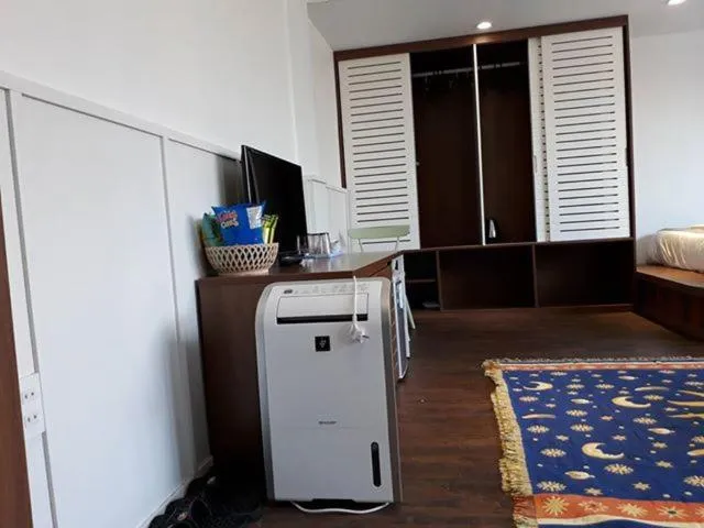 wardrobe in The Scent Boutique Dalat Hotel