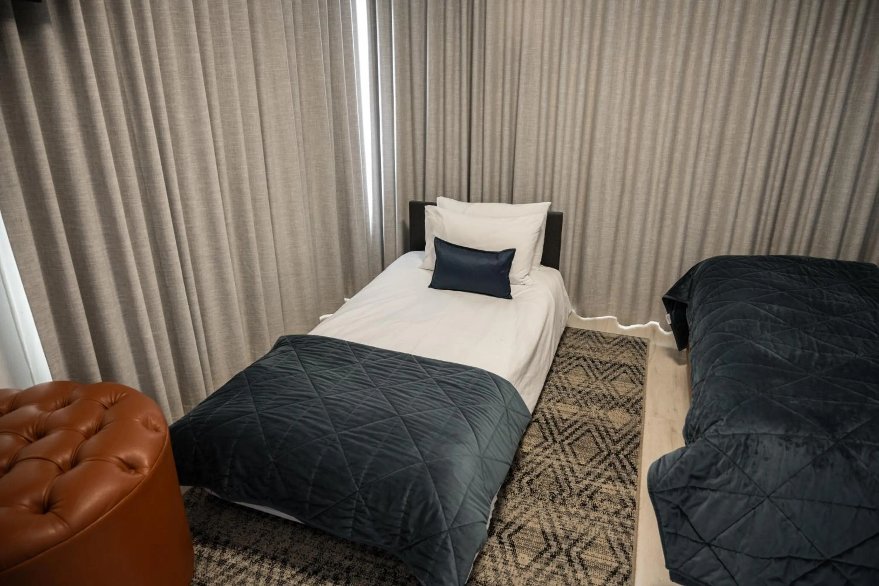 Bed in Guesthouse Indongo Swakopmund