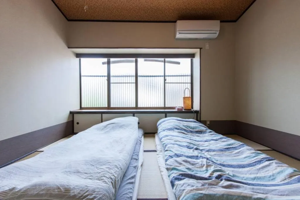 Photo of the whole room, Bed in 伏見稲荷ハウス Fushimi Inari House