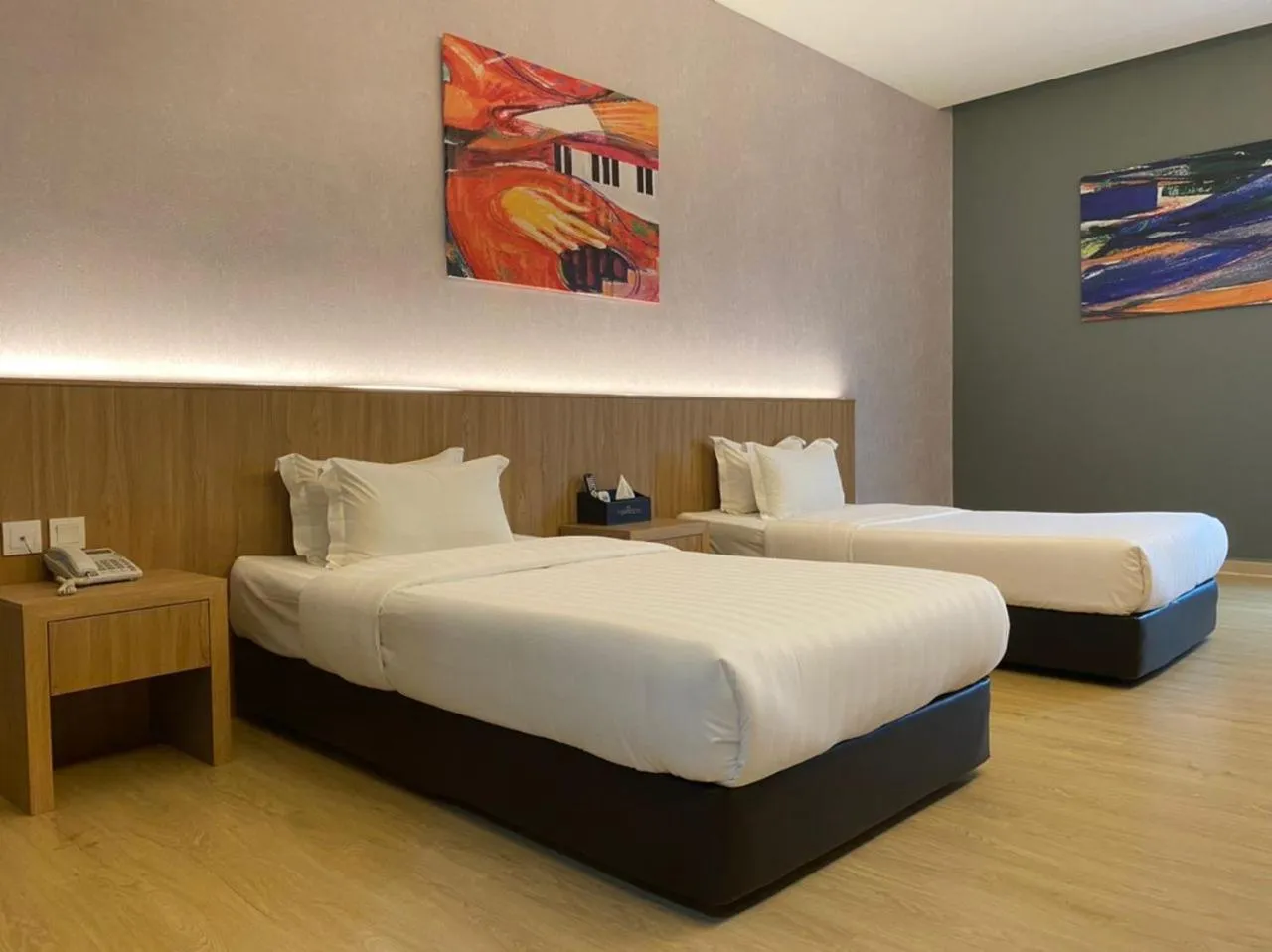 Bed in KLUANG RIVERVIEW HOTEL