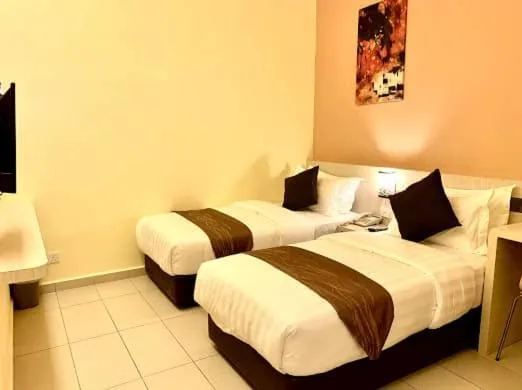 Bed in KLUANG RIVERVIEW HOTEL