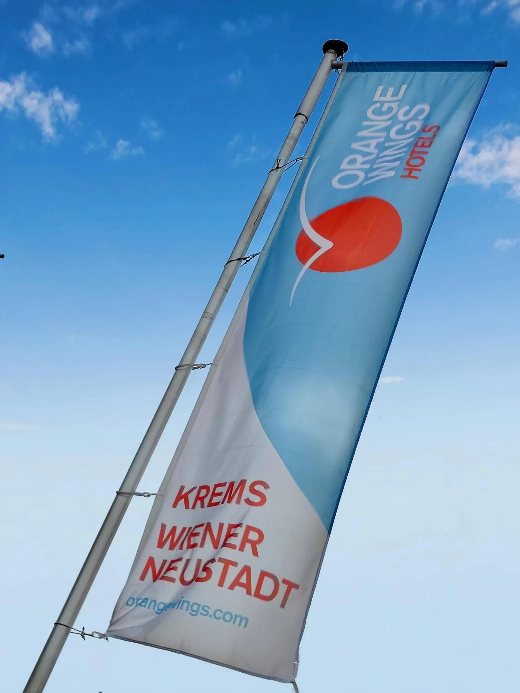 Property logo or sign in Orange Wings Wiener Neustadt