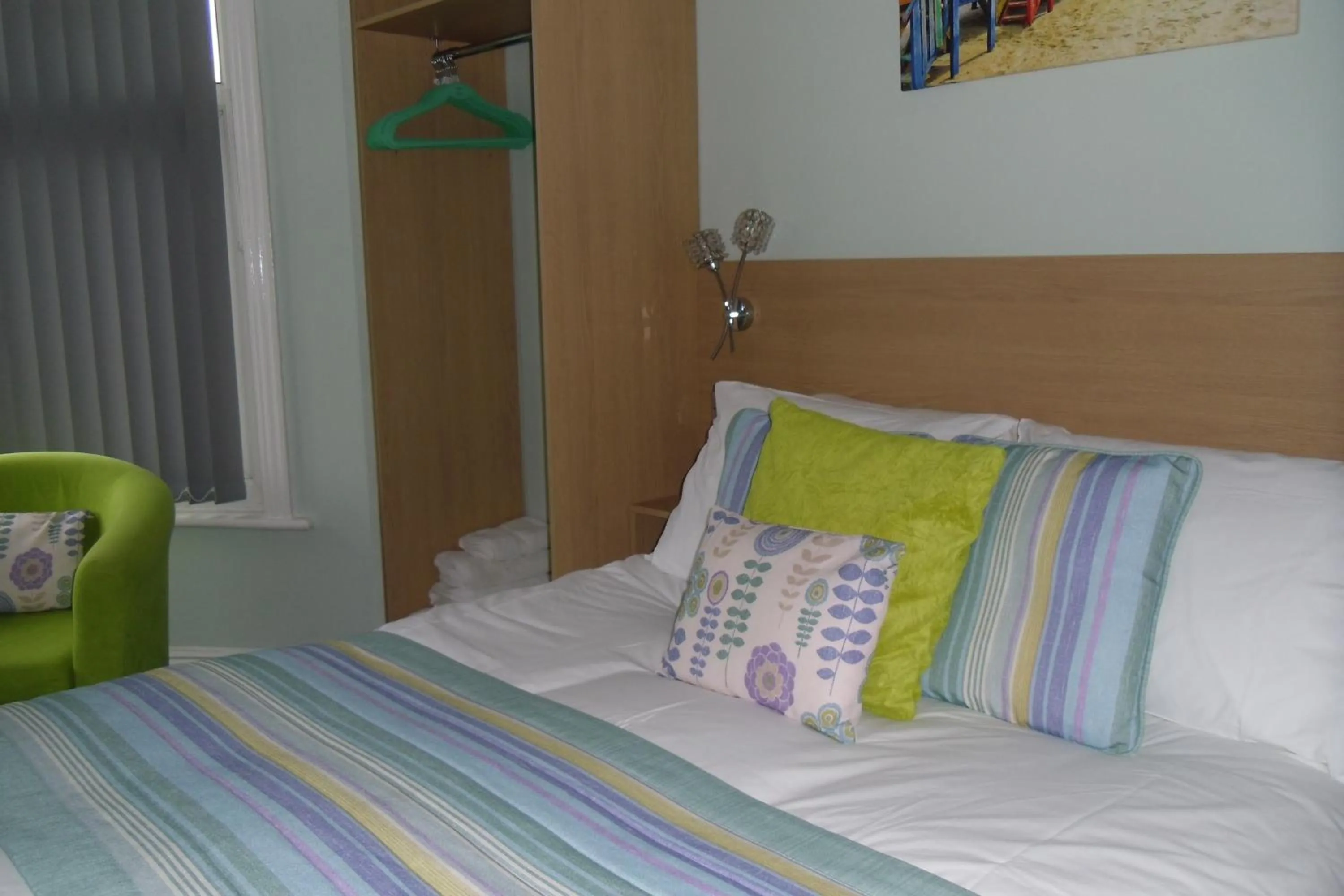 Bed in The Beaucliffe Hotel