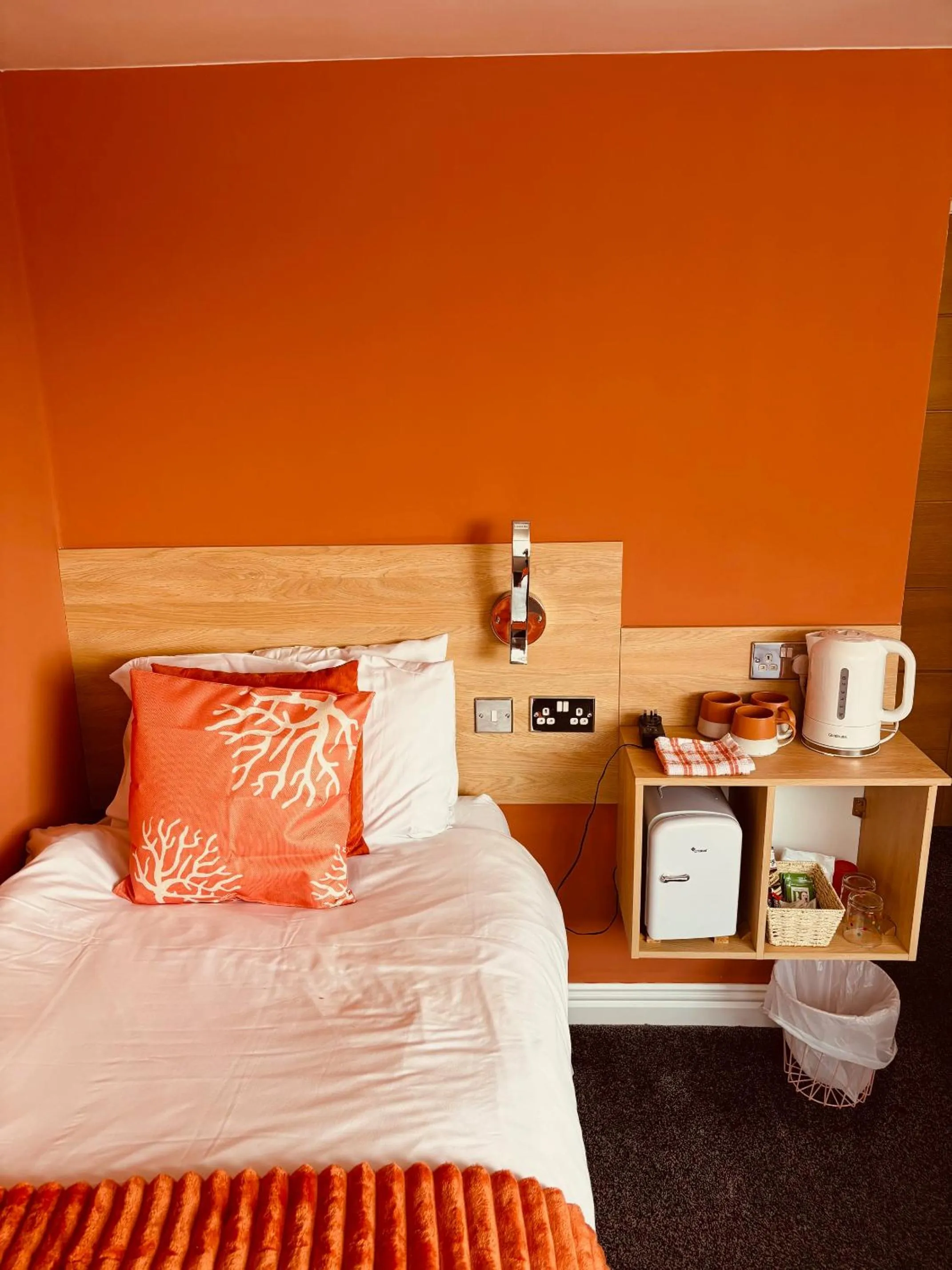 Bed in The Beaucliffe Hotel