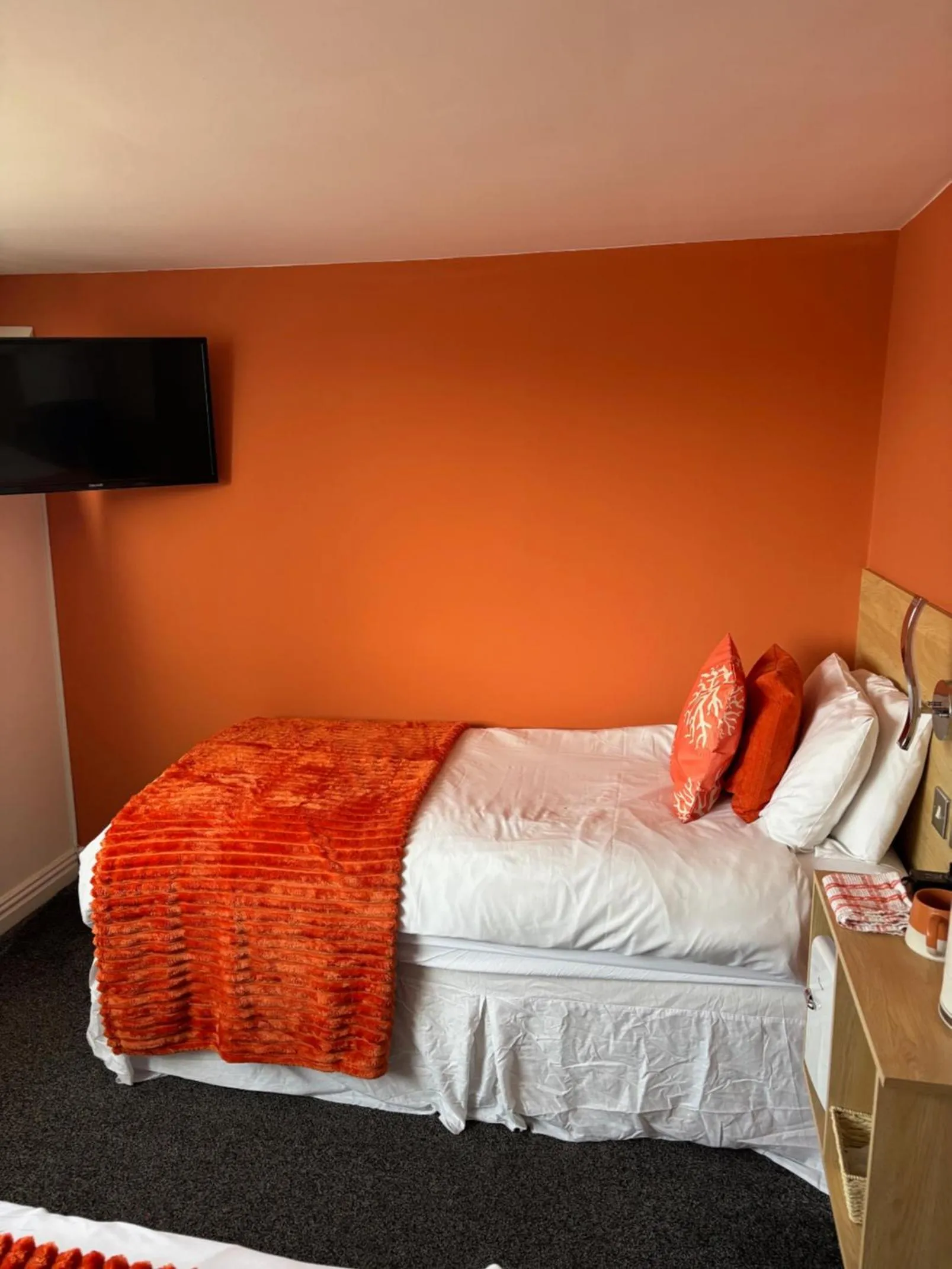 Bed in The Beaucliffe Hotel