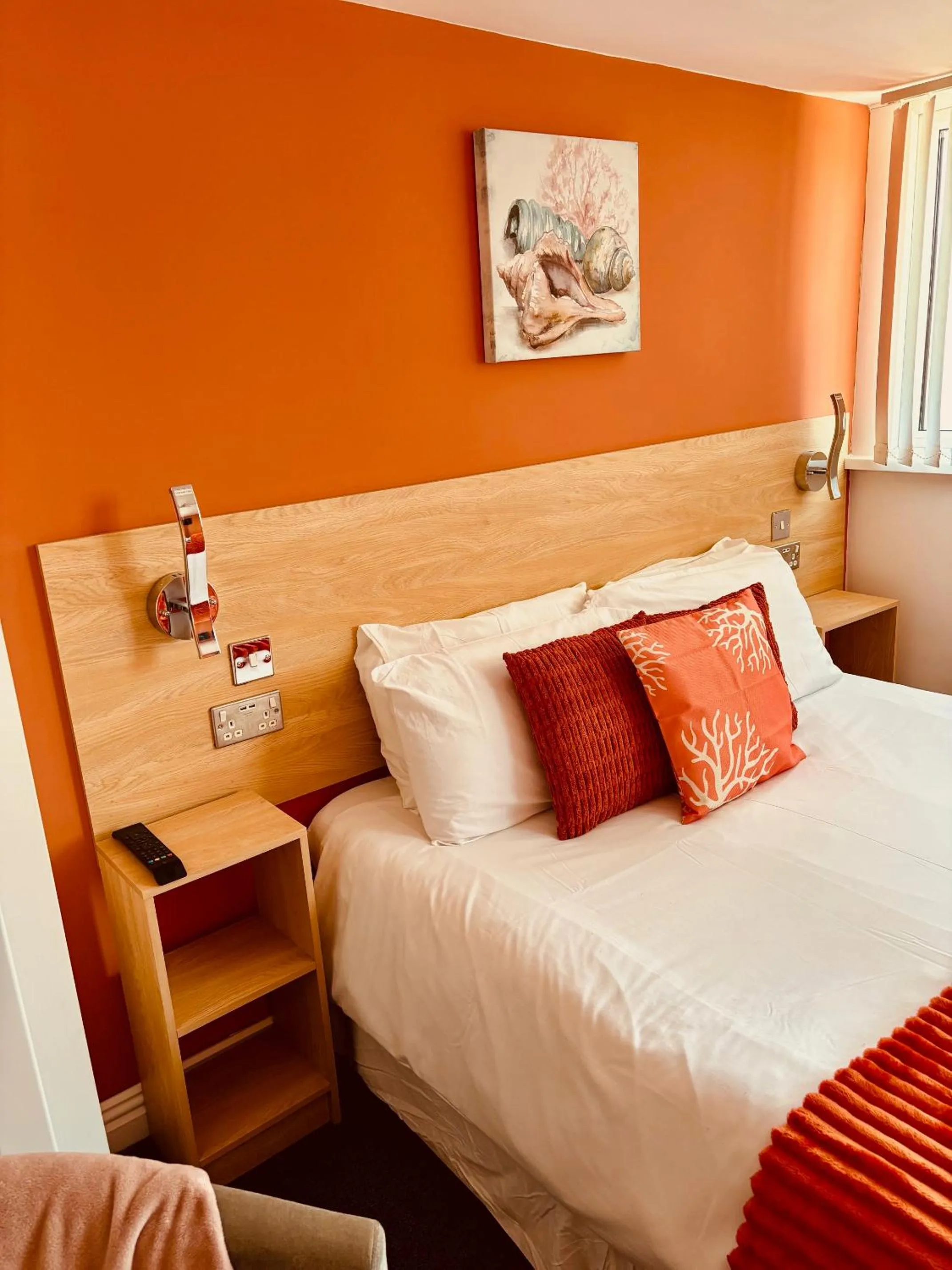 Bed in The Beaucliffe Hotel