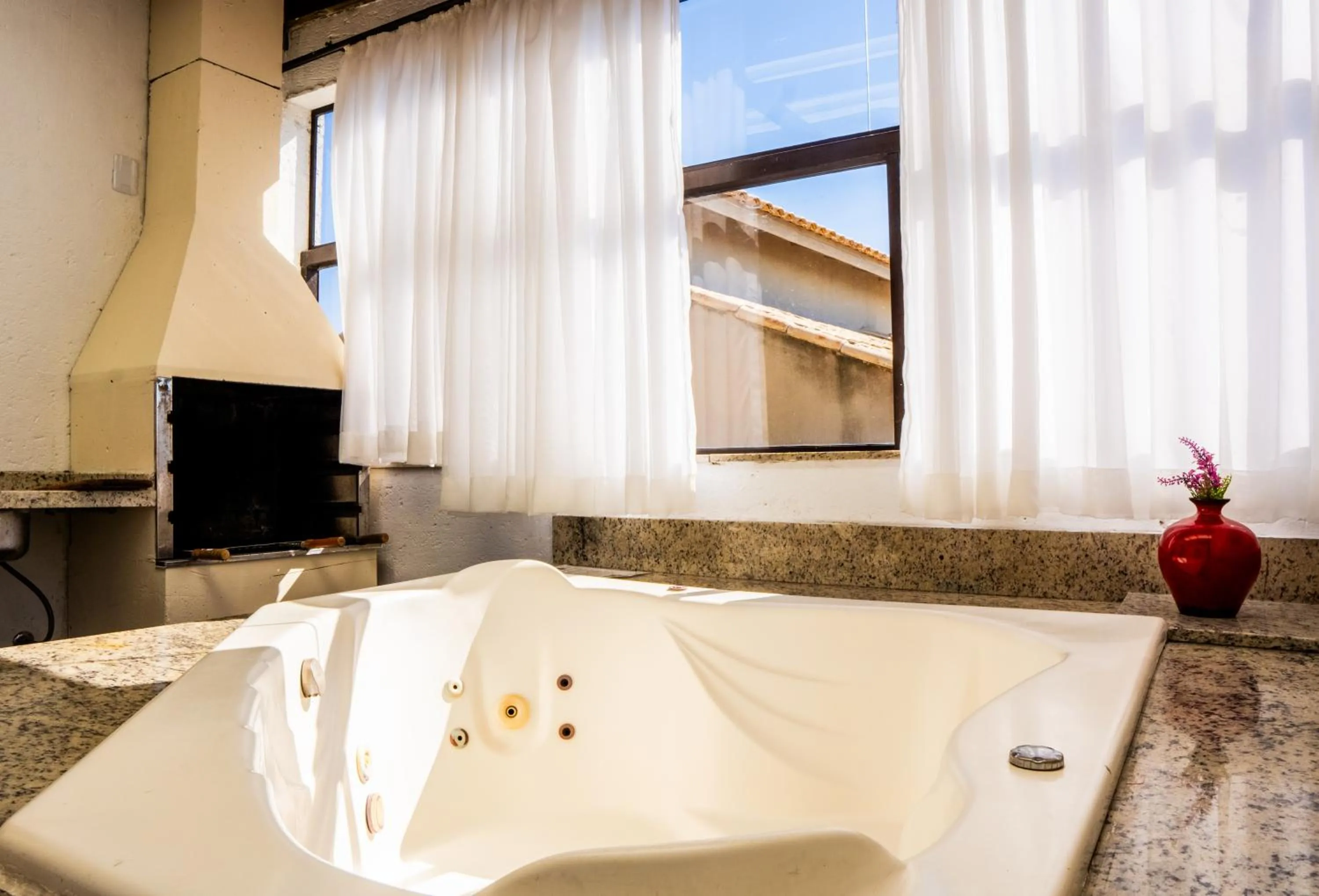 BBQ facilities in Pousada Recanto do Aconchego