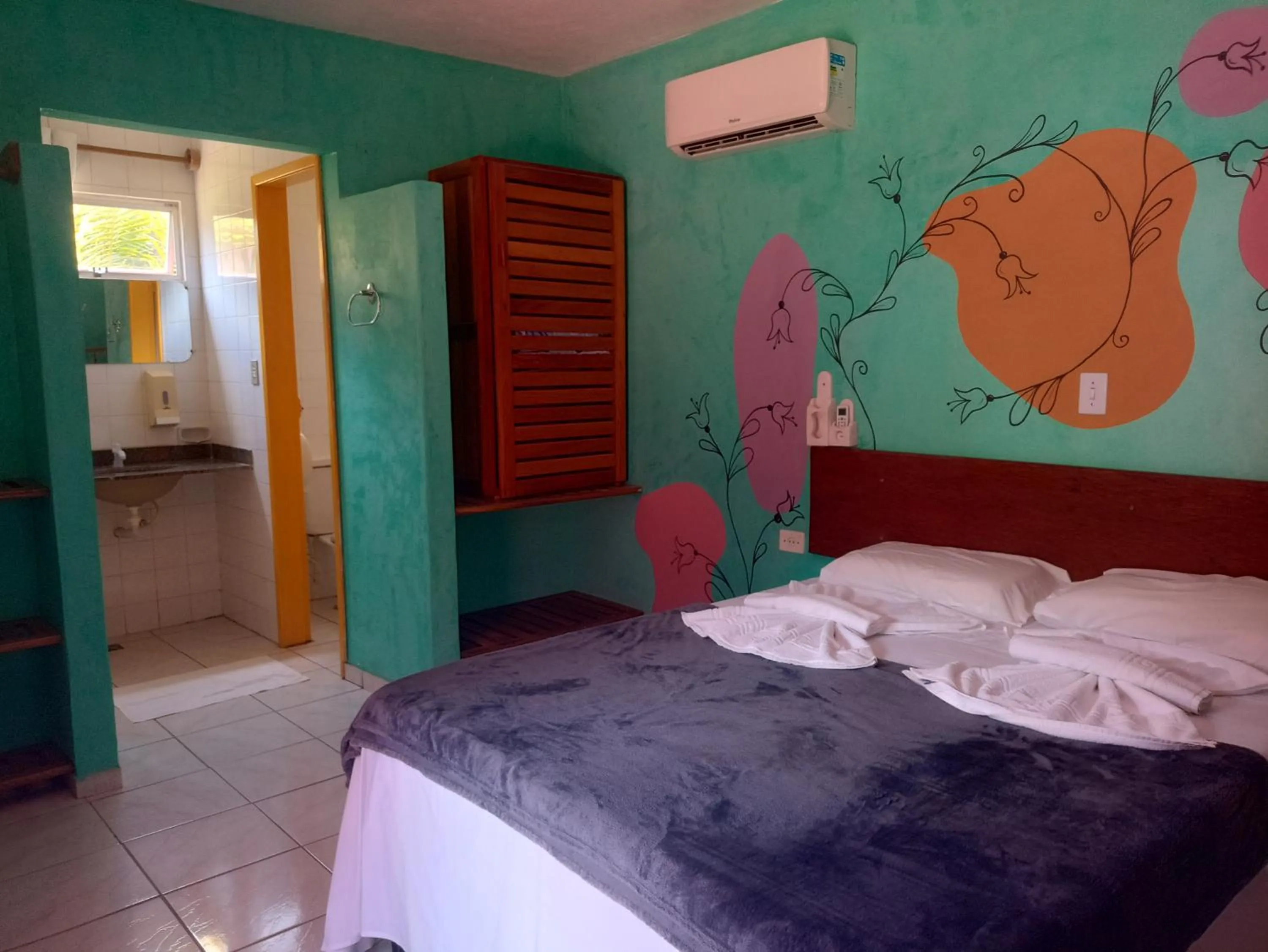 Photo of the whole room in Pousada ZEN Cumuruxatiba