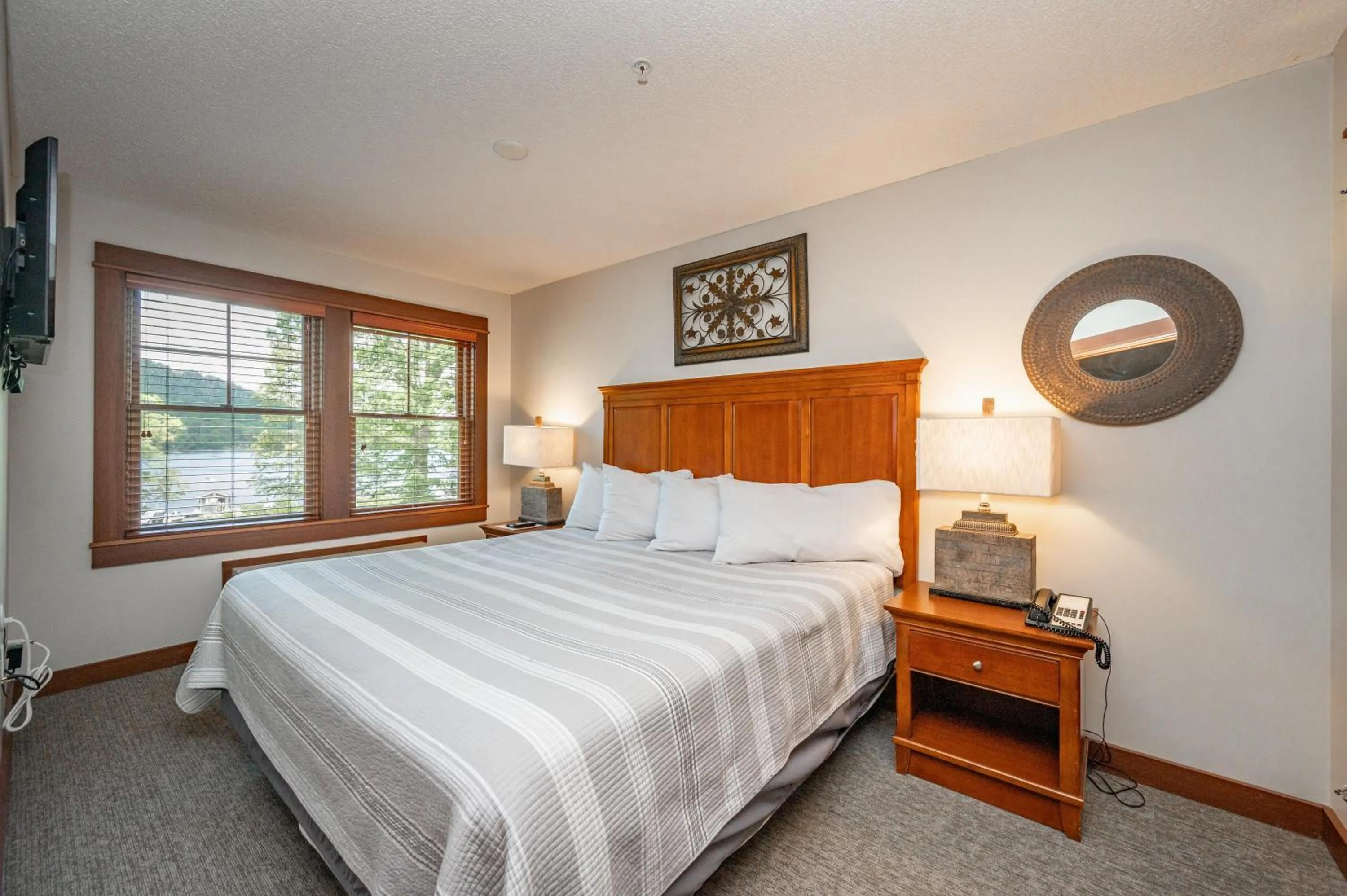 Bed in A117 One Bedroom Lake View