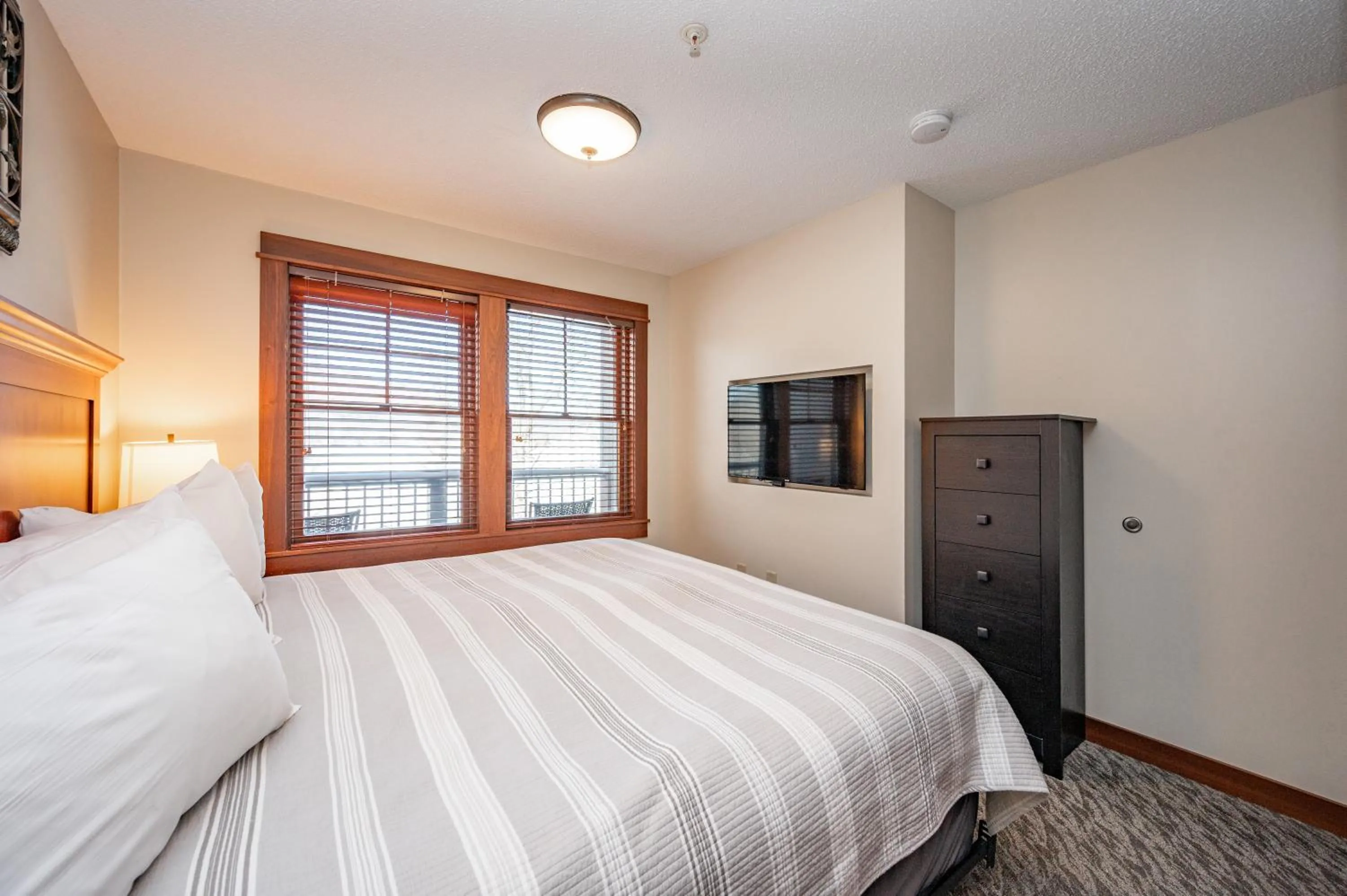 Bed in A205 One Bedroom Lake View