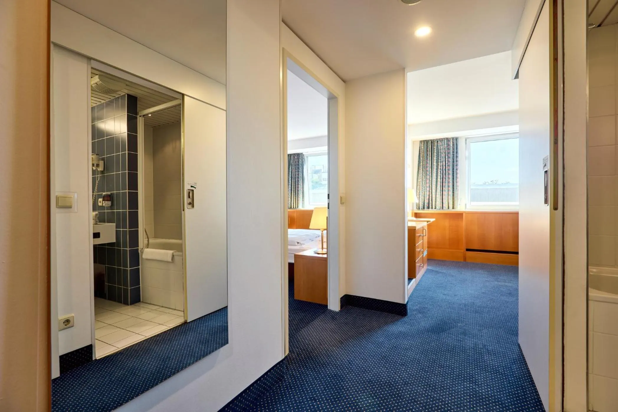 Bathroom, Bed in Hotel Strudlhof Vienna